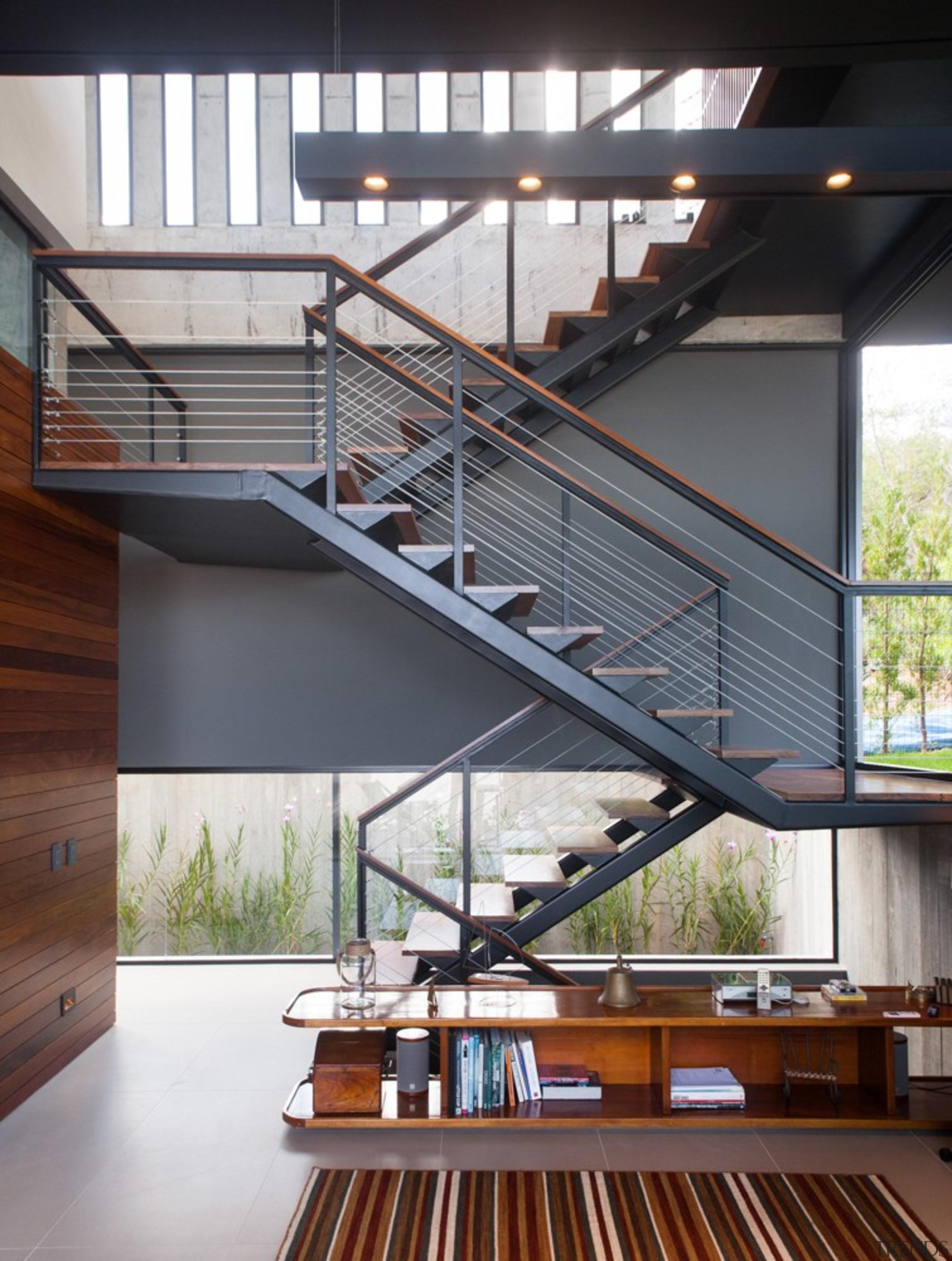 The staircase zig-zags its way up - architecture architecture, daylighting, handrail, house, stairs, gray, white