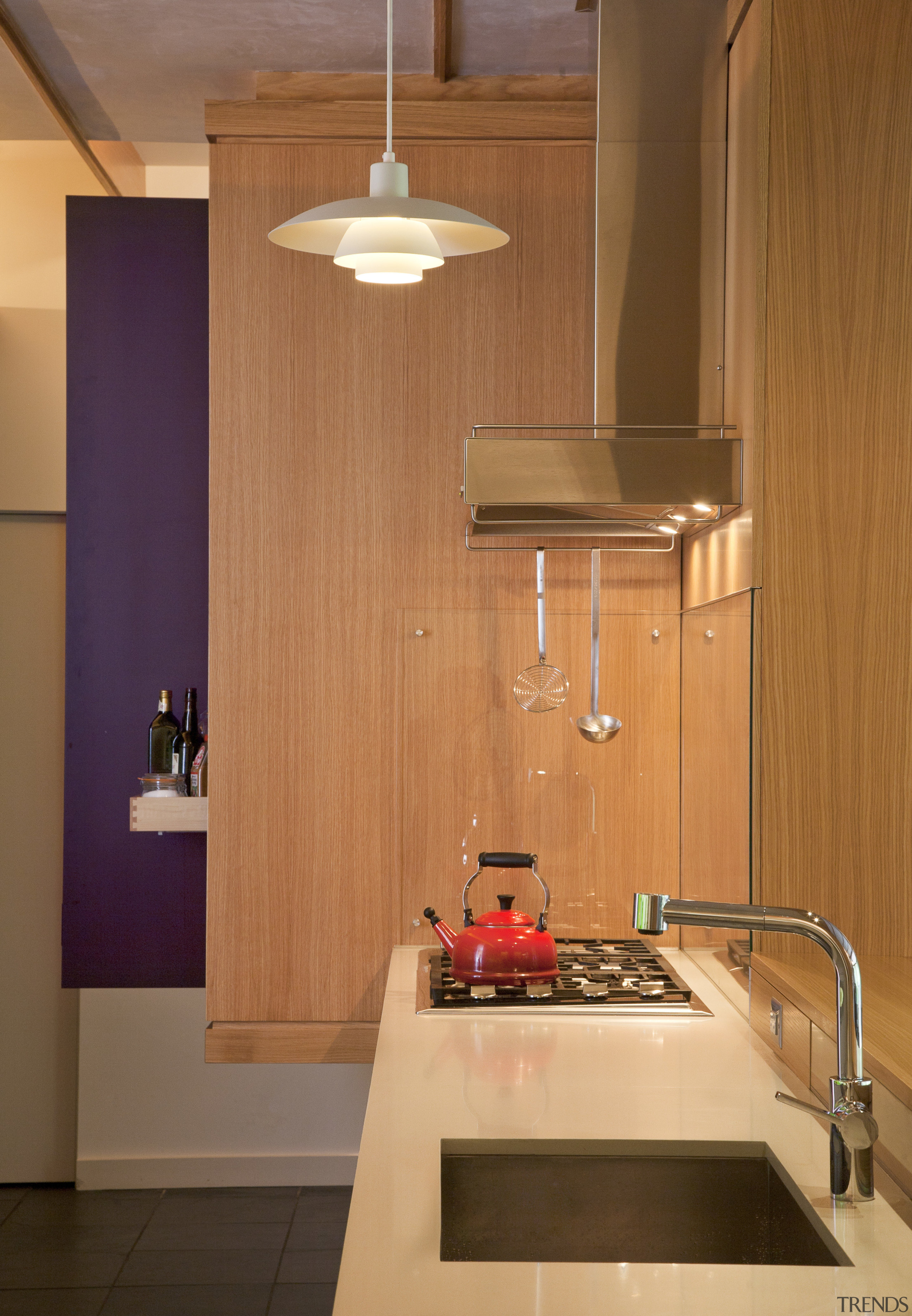 View of modernist style kitchen with wooden cabinetry architecture, cabinetry, ceiling, countertop, floor, hardwood, interior design, kitchen, light fixture, lighting, room, under cabinet lighting, wall, wood, orange, brown