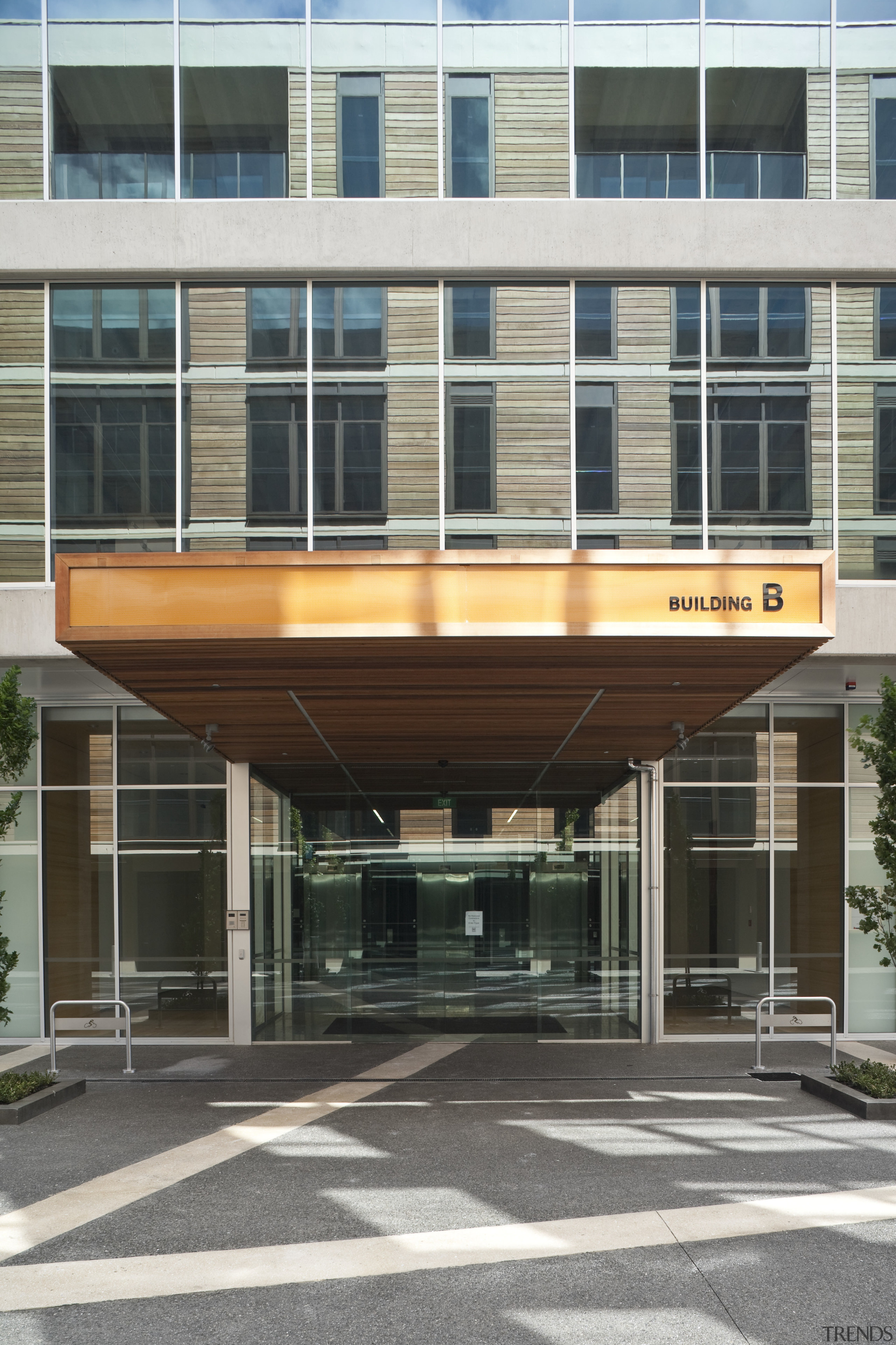 View of the 8 Nugent development. - View architecture, building, commercial building, condominium, corporate headquarters, facade, mixed use, real estate, gray, black