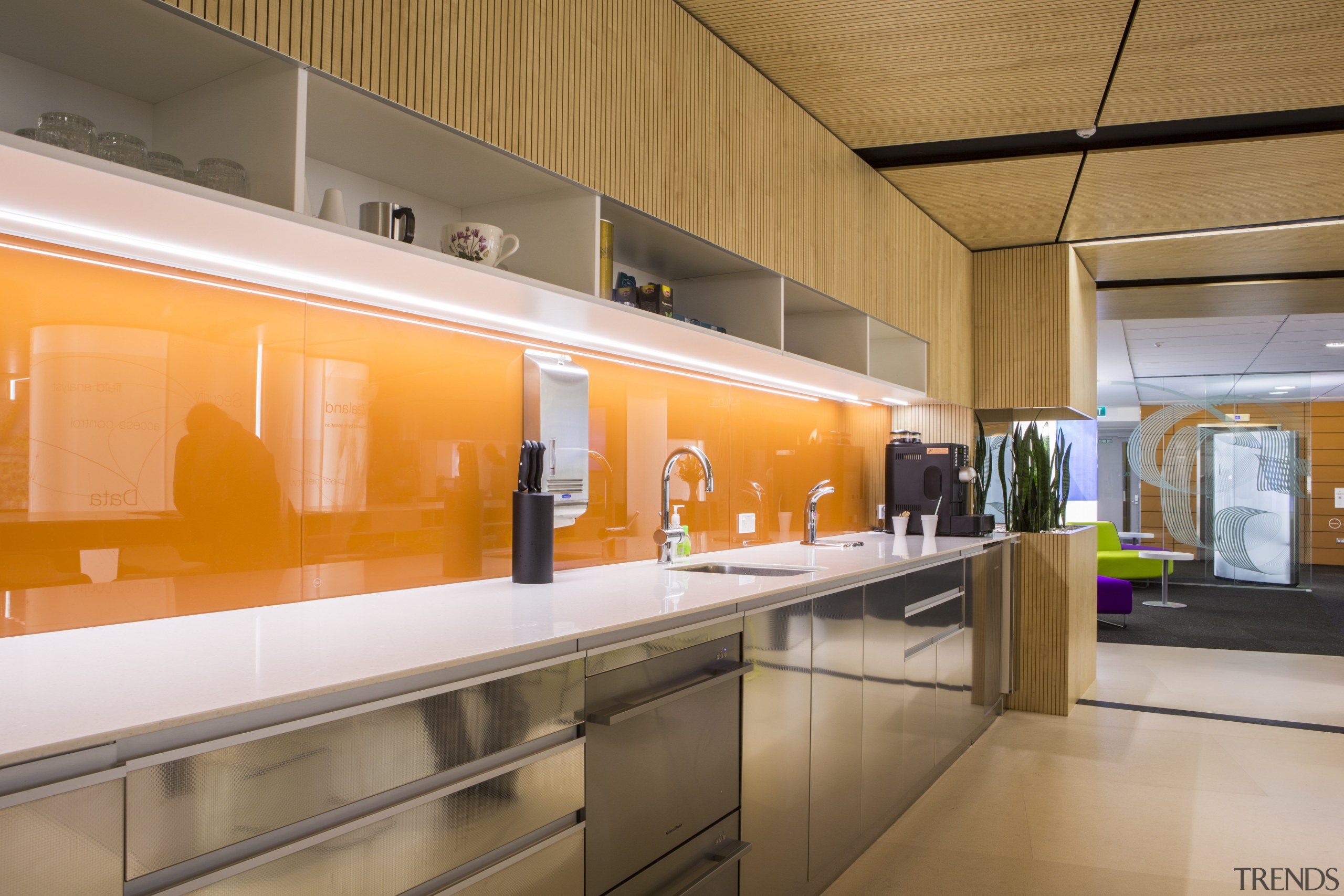 Orange colourbacked glass features behind the kitchen cabinetry countertop, interior design, kitchen, orange, brown