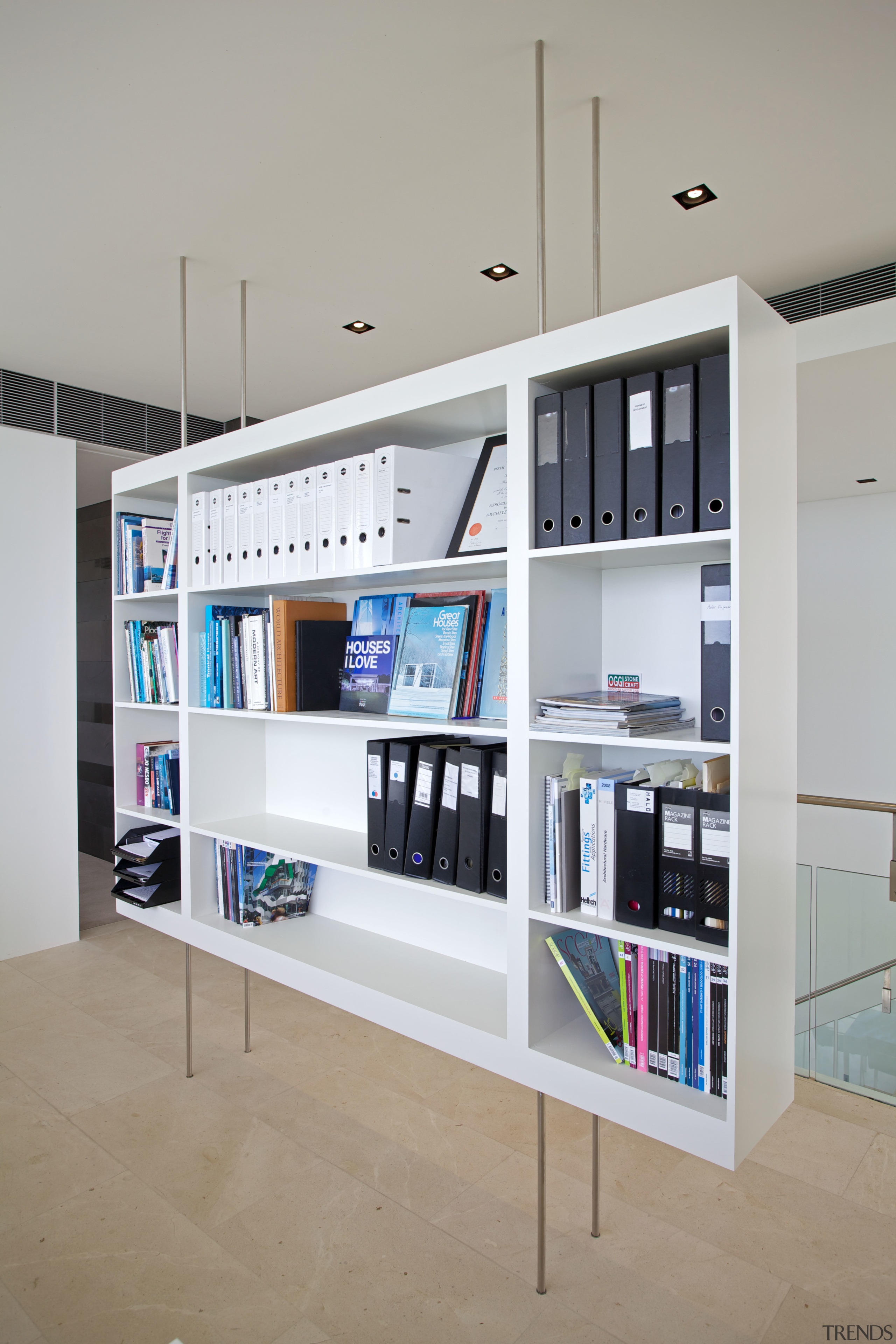 Architect Gary Banham wanted cabinetry that appeared to bookcase, furniture, interior design, product design, shelf, shelving, gray