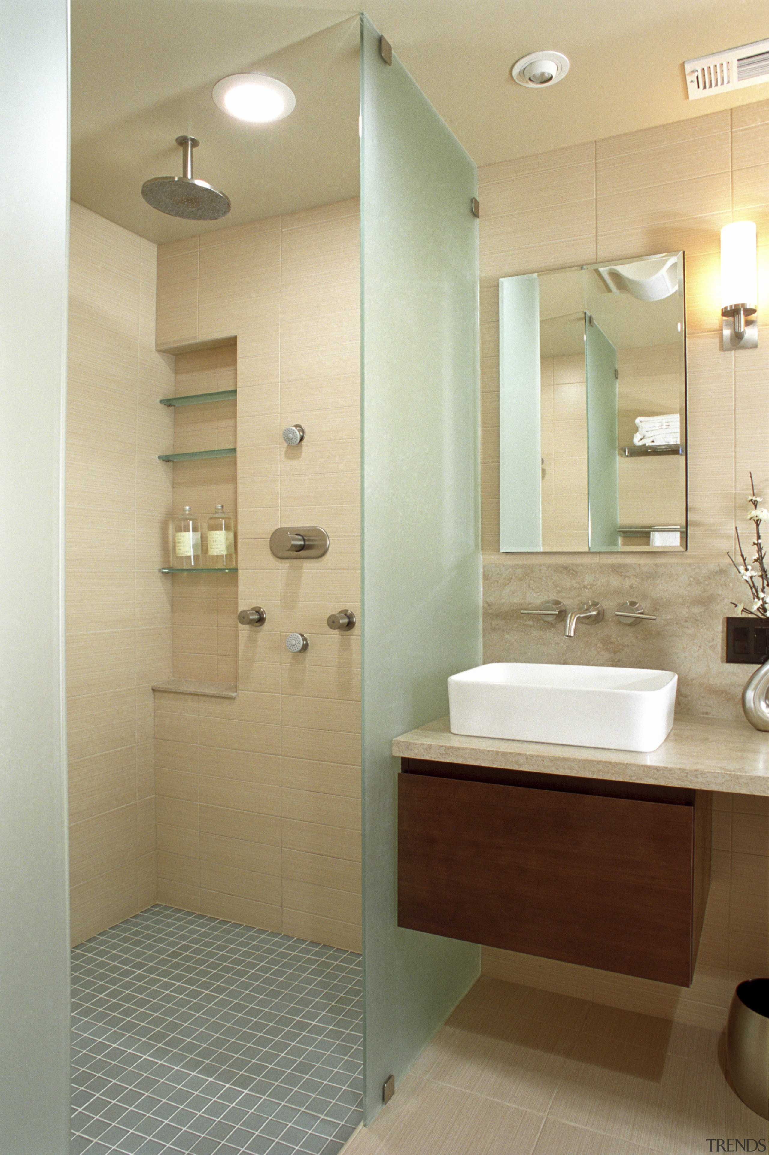 A view of some bathroom ware from NKBA. bathroom, bathroom accessory, bathroom cabinet, floor, home, interior design, plumbing fixture, room, sink, orange