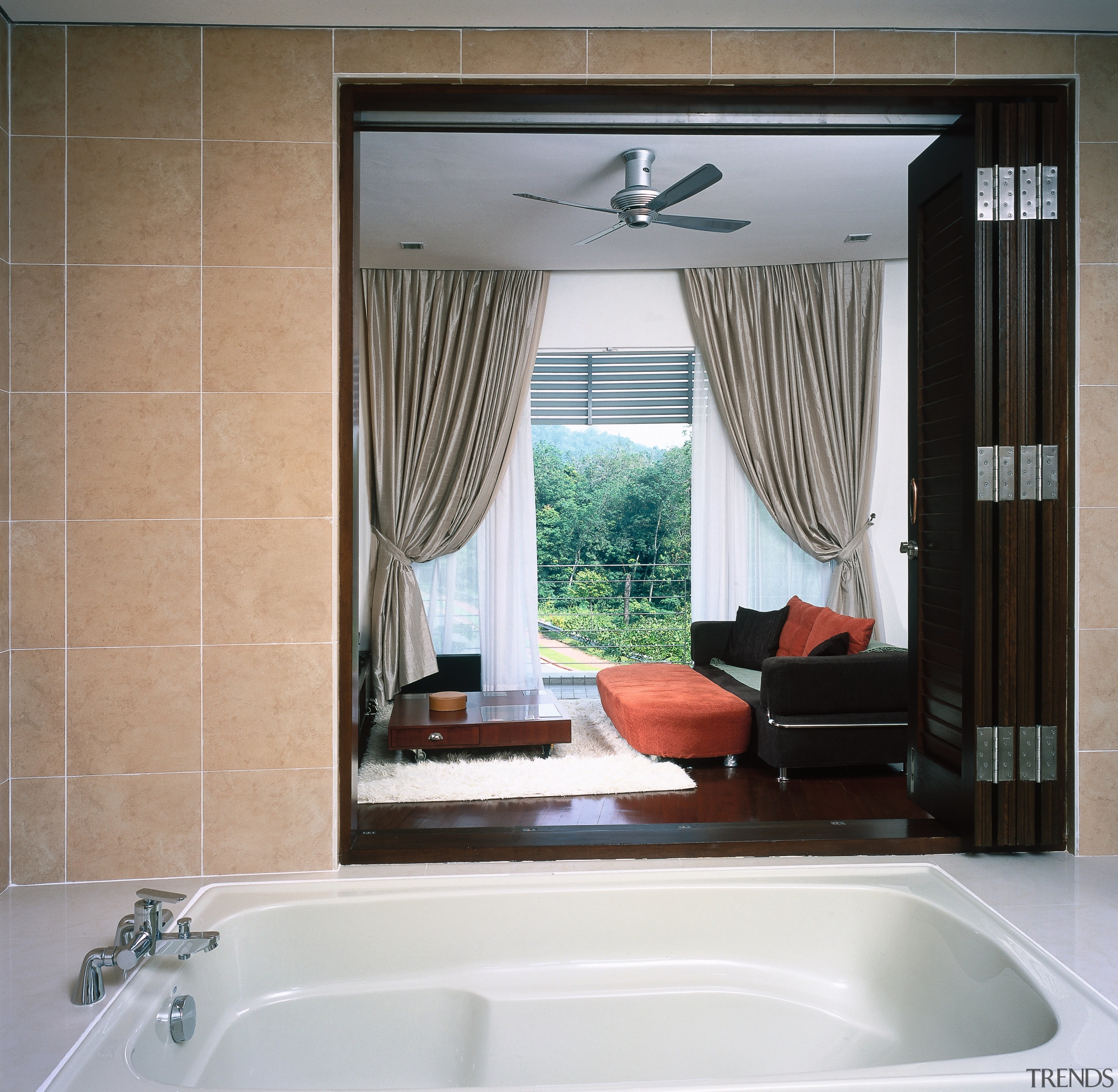 A view of the bathroom featuring, bath, frameless bathroom, curtain, interior design, room, window, window covering, window treatment, gray