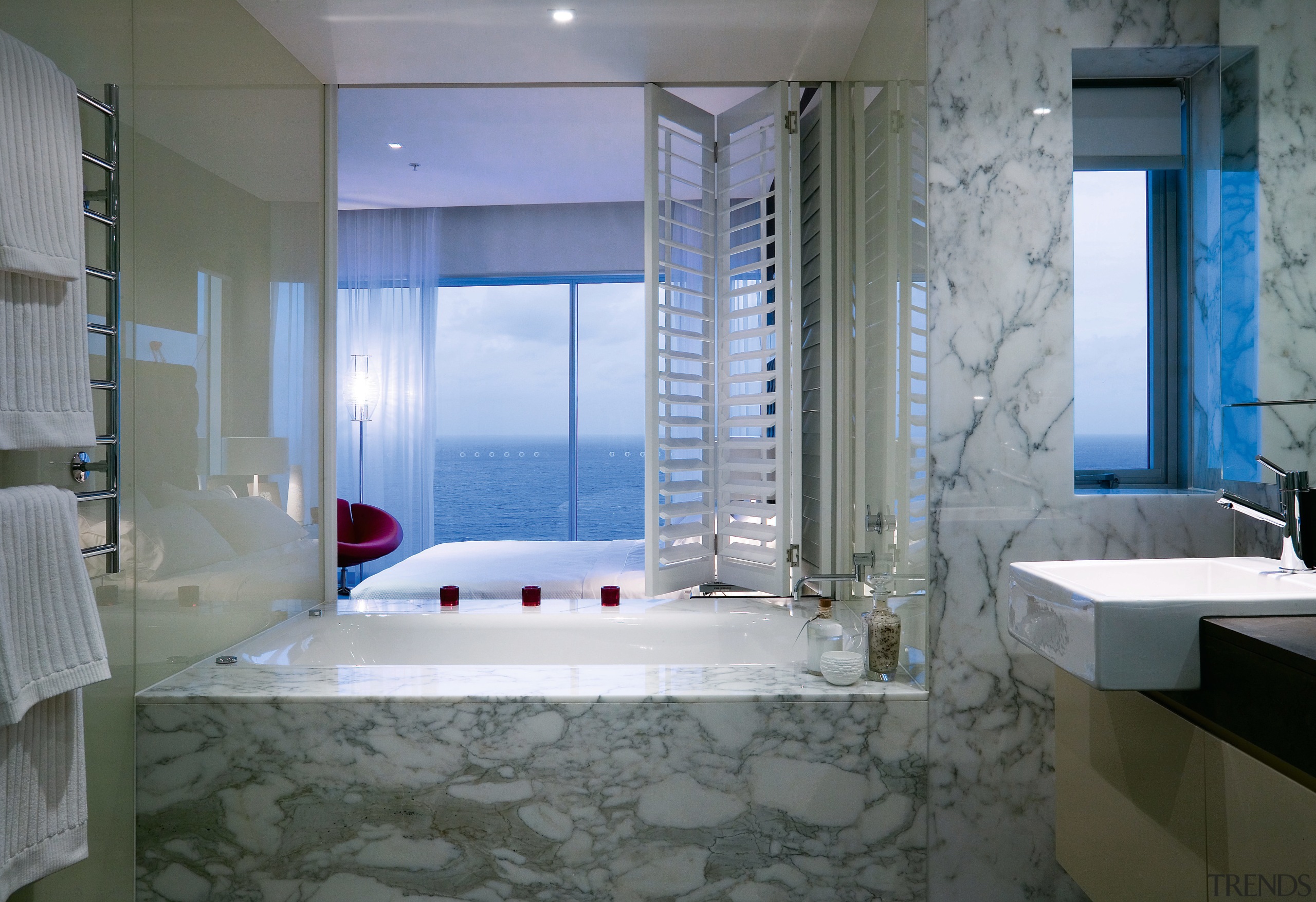 A view of the bathroom featuring marble tiles, bathroom, interior design, room, suite, gray