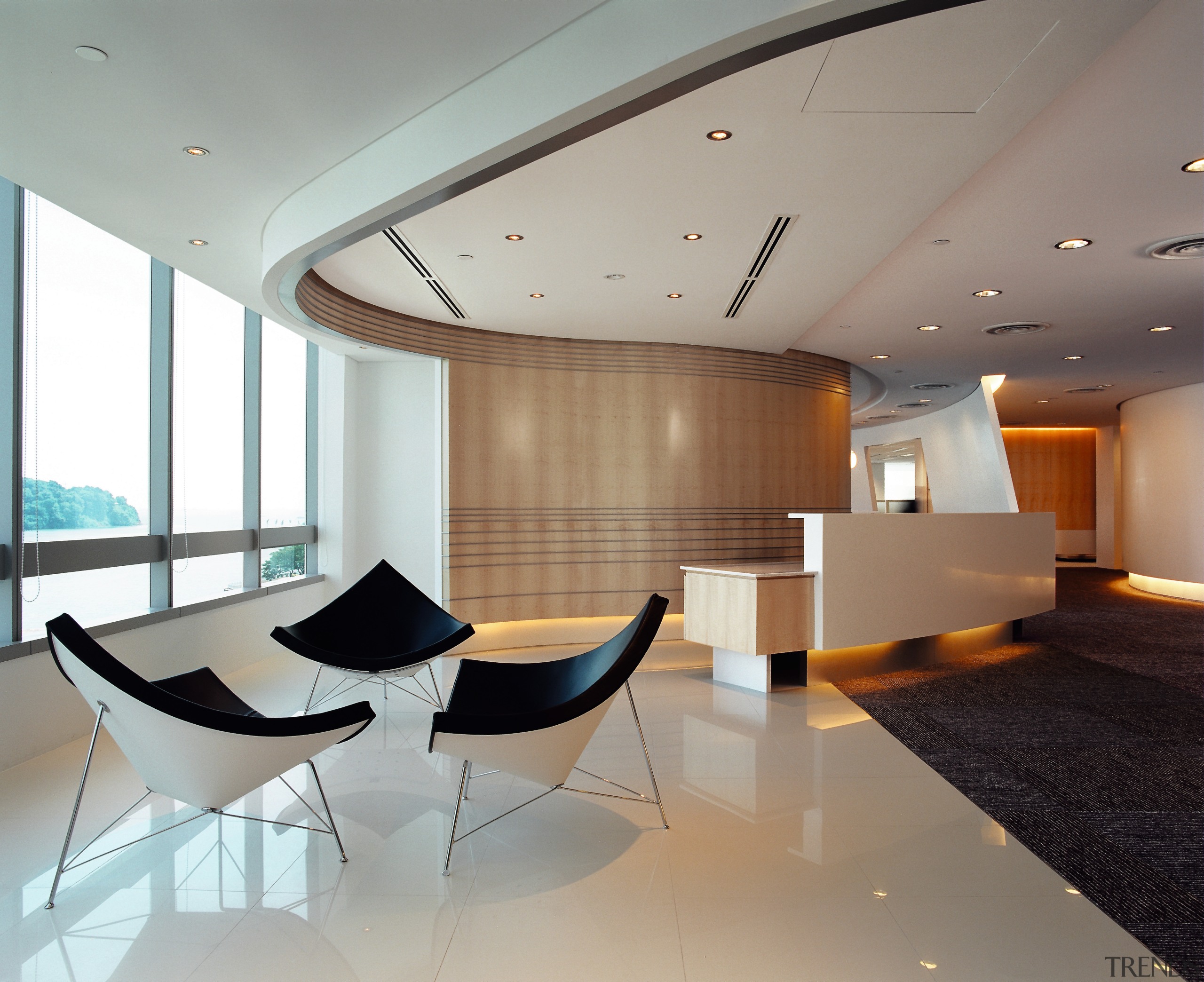 Visitor seating area in office with black and architecture, ceiling, conference hall, daylighting, floor, flooring, furniture, interior design, lobby, product design, table, gray