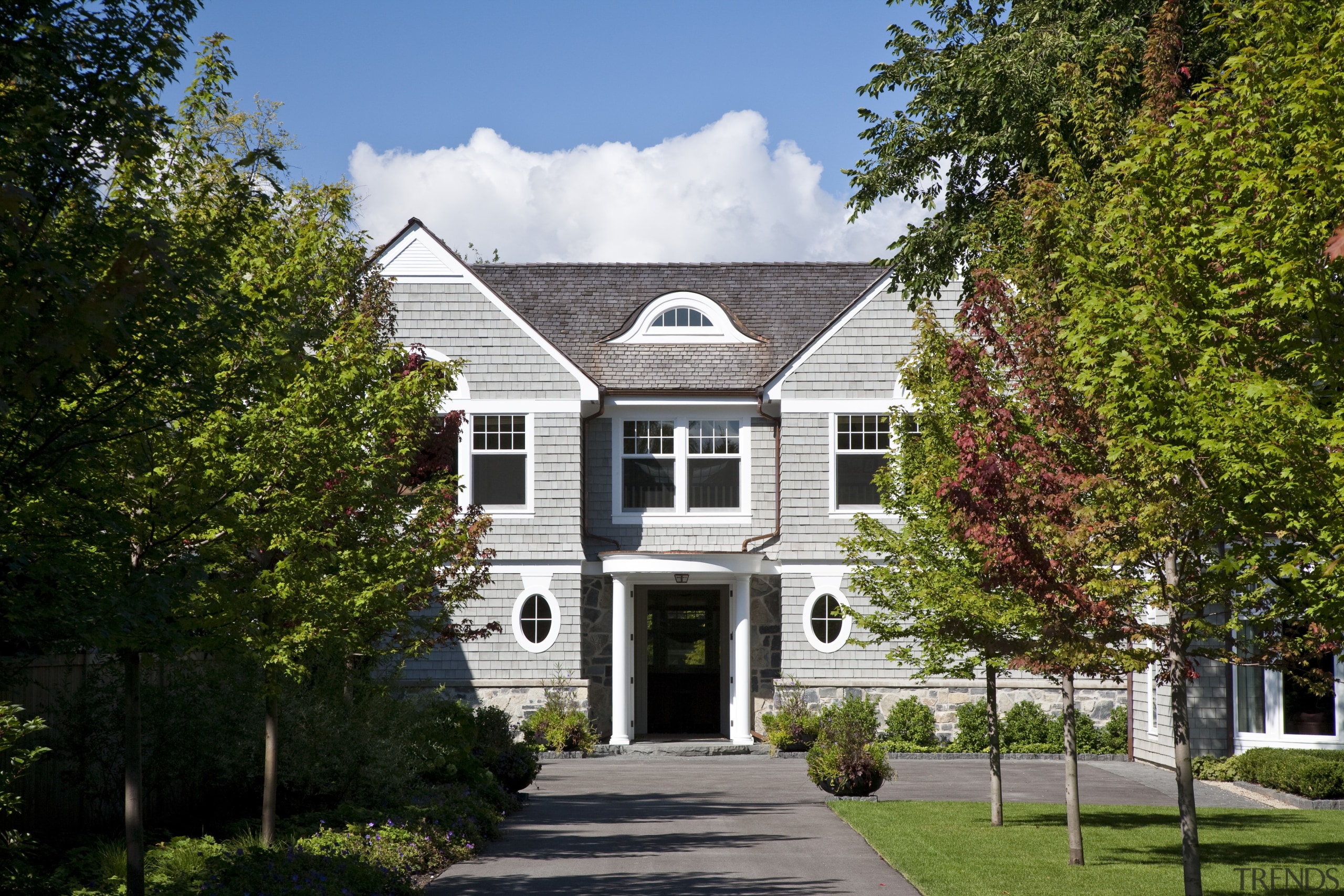 View of the homes exterior featuring stained cider architecture, building, cottage, estate, facade, home, house, mansion, neighbourhood, plant, property, real estate, residential area, suburb, tree, brown