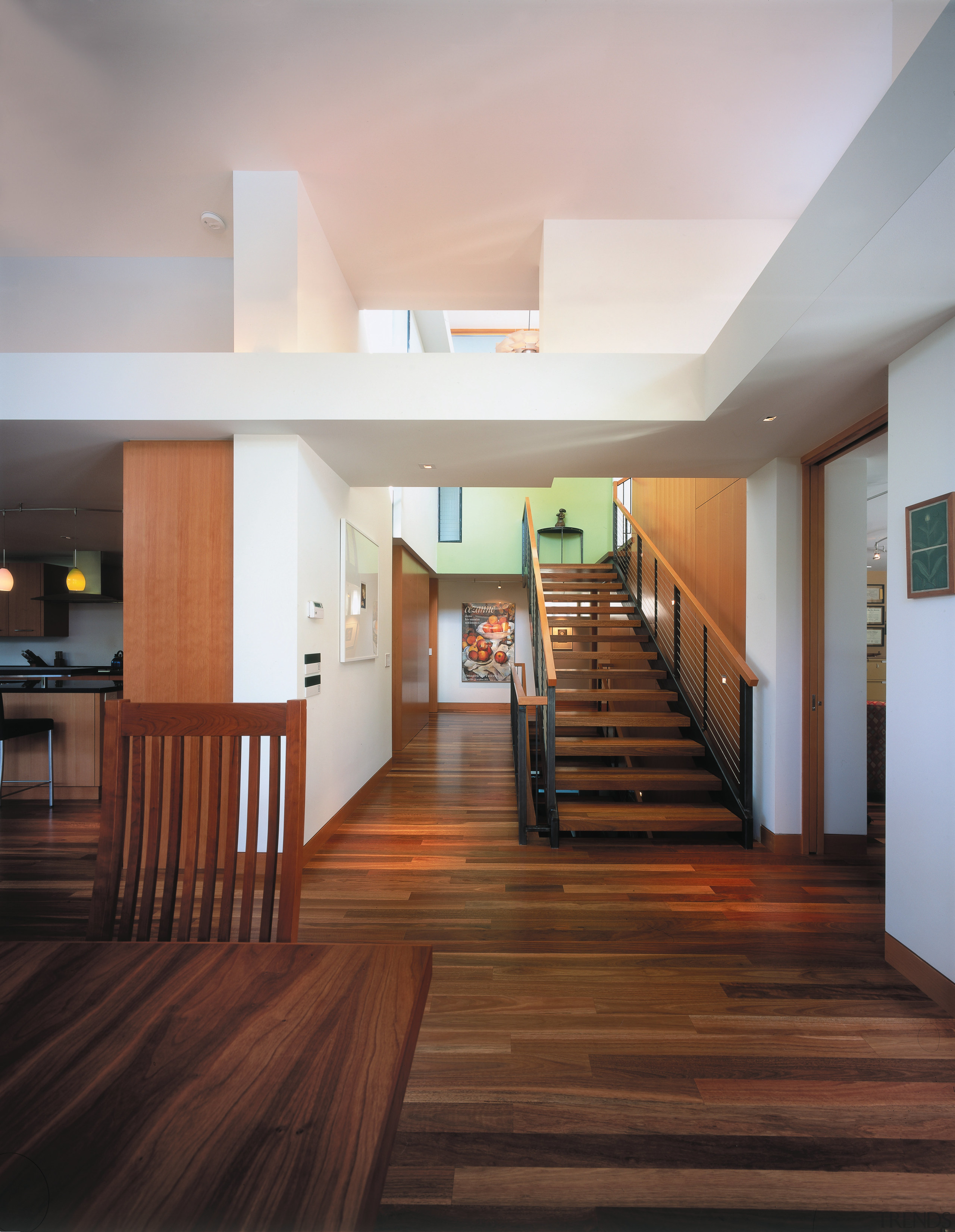 view of the hallway and staircase featuring orange architecture, ceiling, daylighting, floor, flooring, hardwood, home, house, interior design, laminate flooring, lobby, real estate, stairs, wood, wood flooring, gray