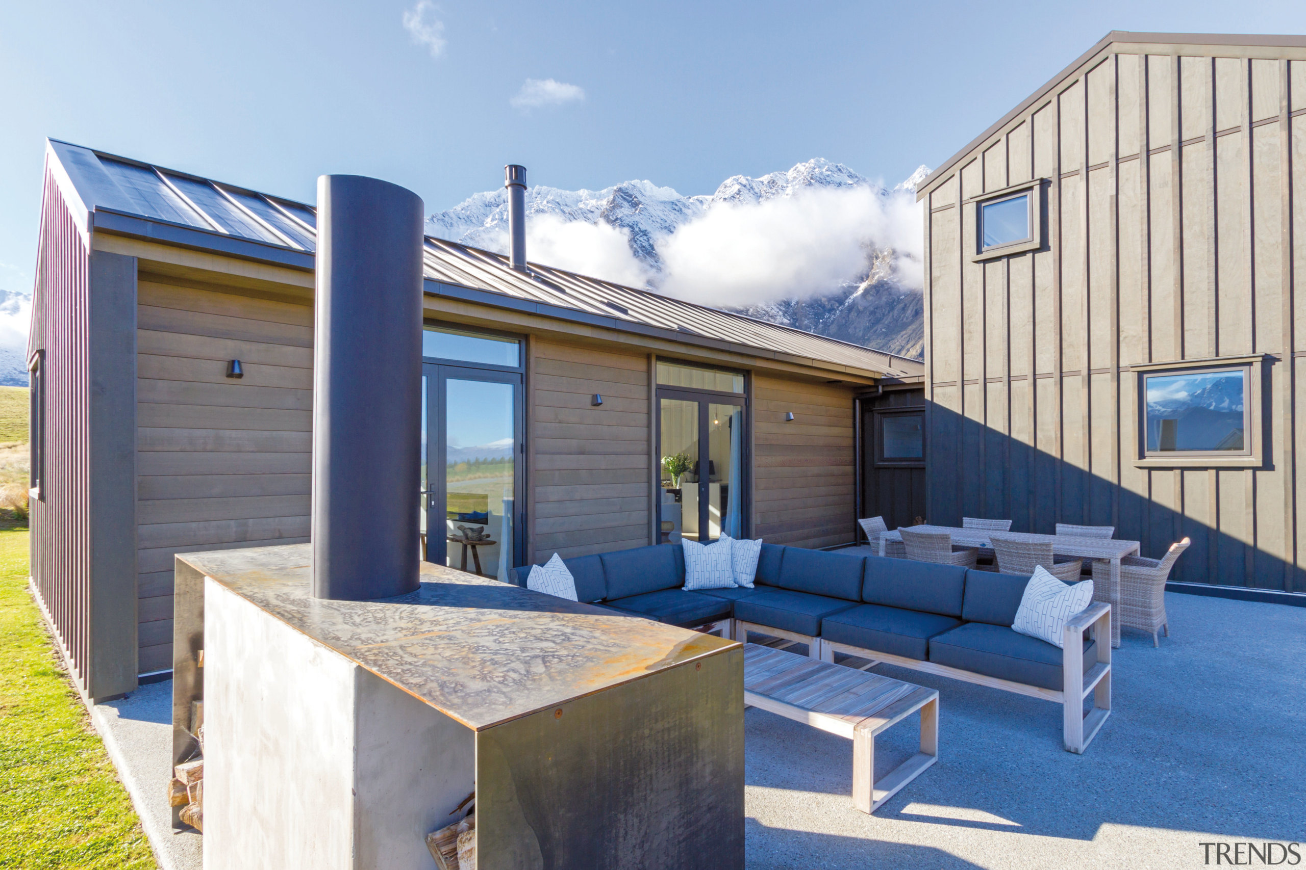 This GJ Gardner Queenstown home includes sheltered outdoor architecture, home, house, property, real estate, roof, teal