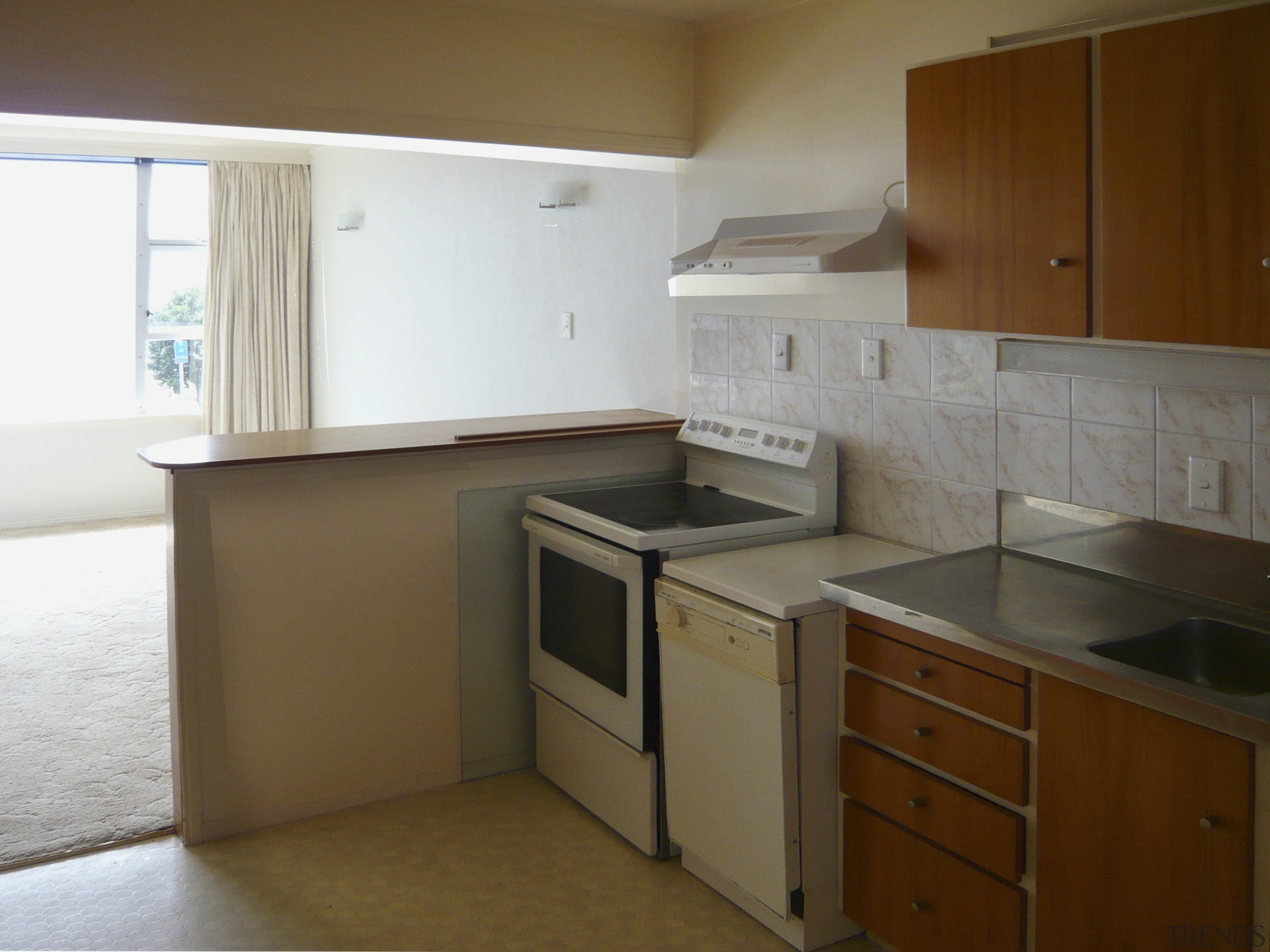 Image of the kitchen prior to renovations. - cabinetry, countertop, floor, hardwood, home, kitchen, property, real estate, room, brown