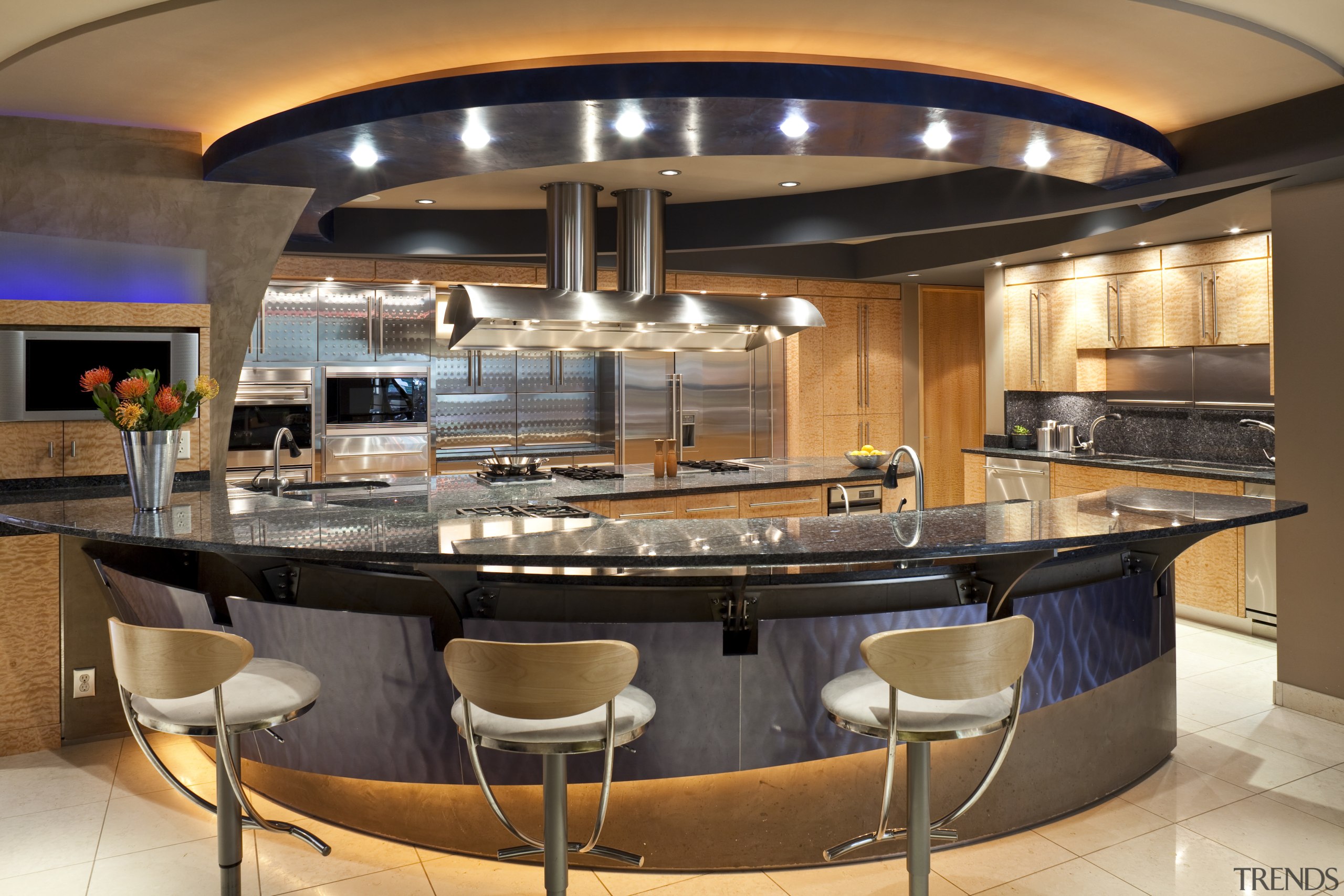 View of a kitchen which features a U-shaped countertop, interior design, kitchen, brown