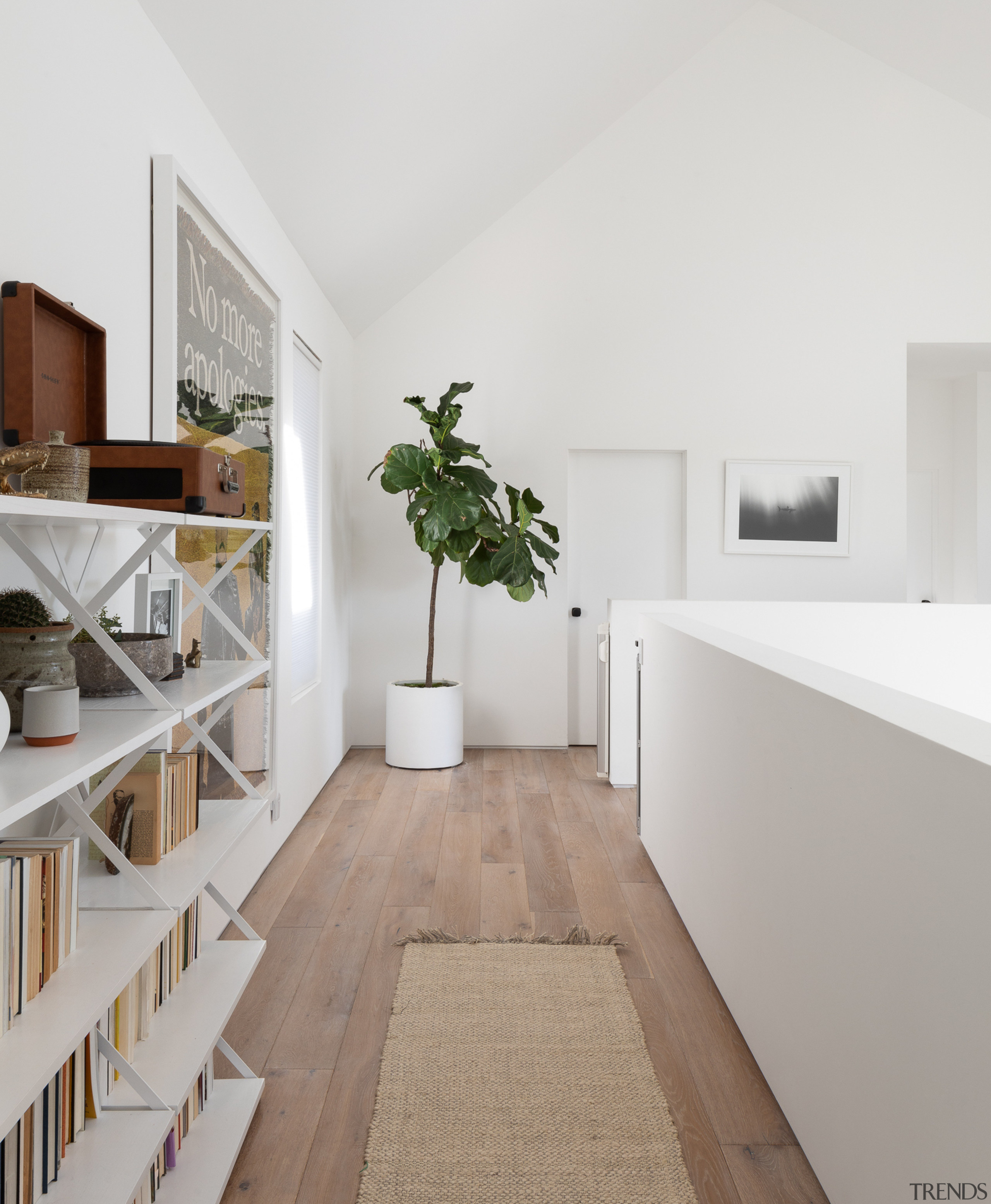 The upstairs hallway serves as a circulation space 