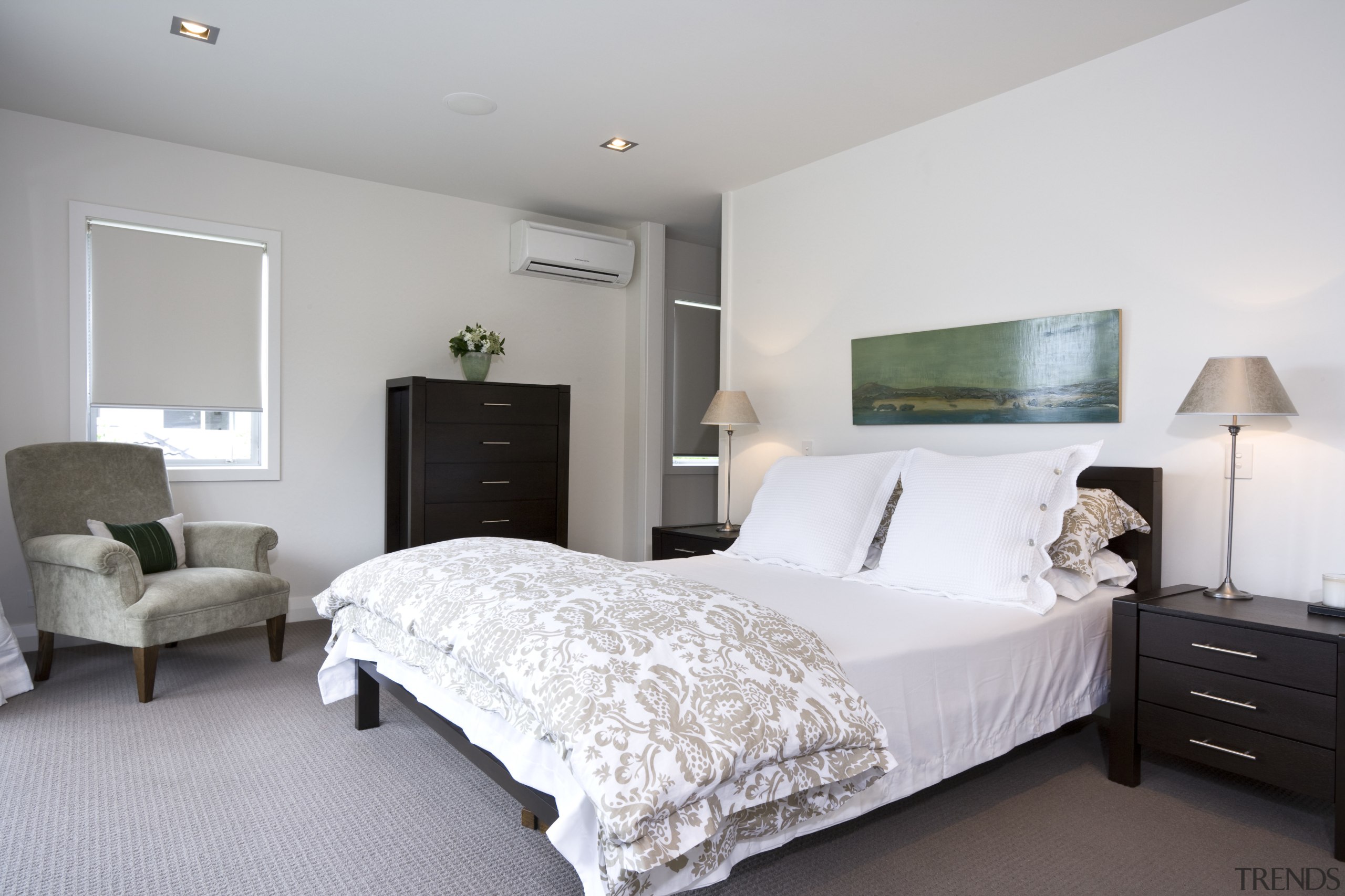 Image of the bedroom in this new home. bed frame, bedroom, home, interior design, mattress, property, real estate, room, wall, gray, white