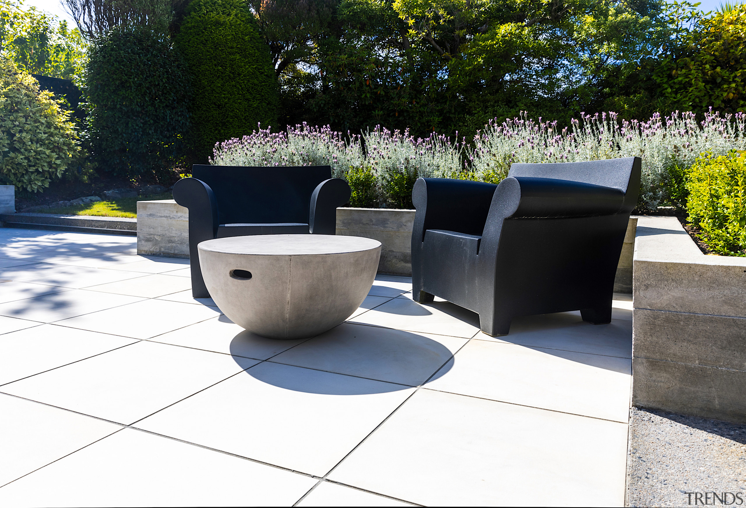 A sculptural table resembles a split boulder. 