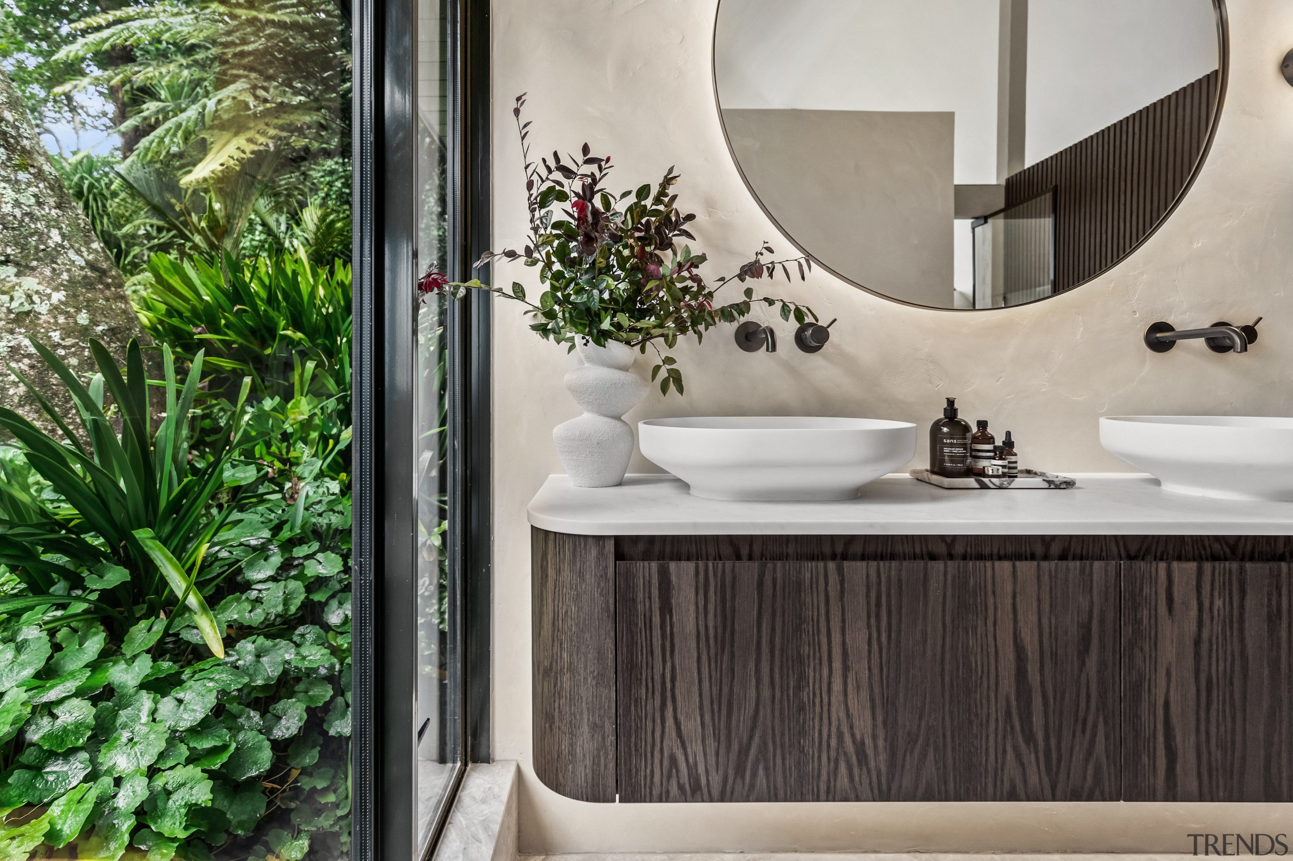 The large round mirror was specified to bounce 