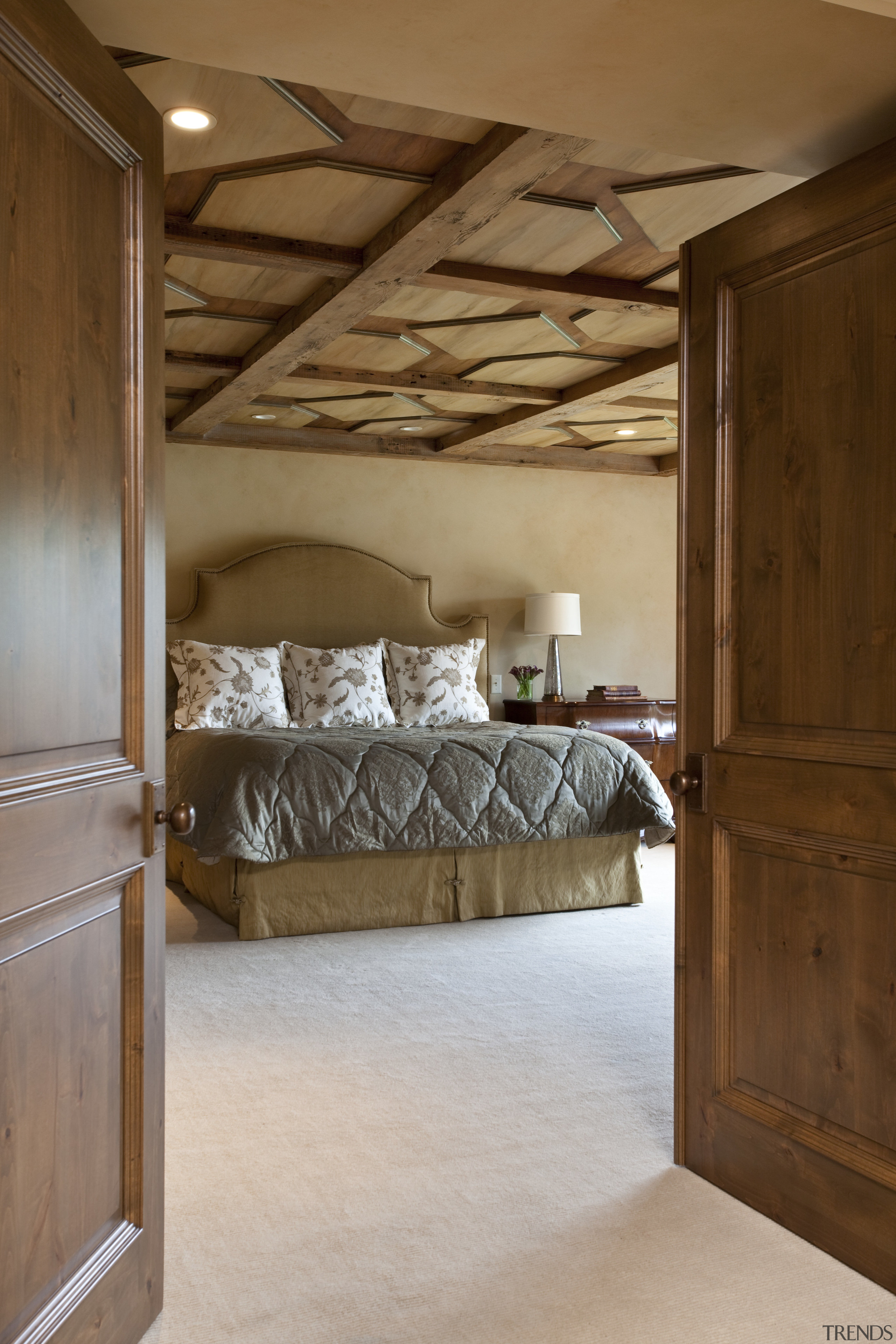 View of the master bedroom featuring a custom architecture, bed, bed frame, bedroom, ceiling, floor, flooring, furniture, home, interior design, room, wall, wood, wood flooring, brown, gray