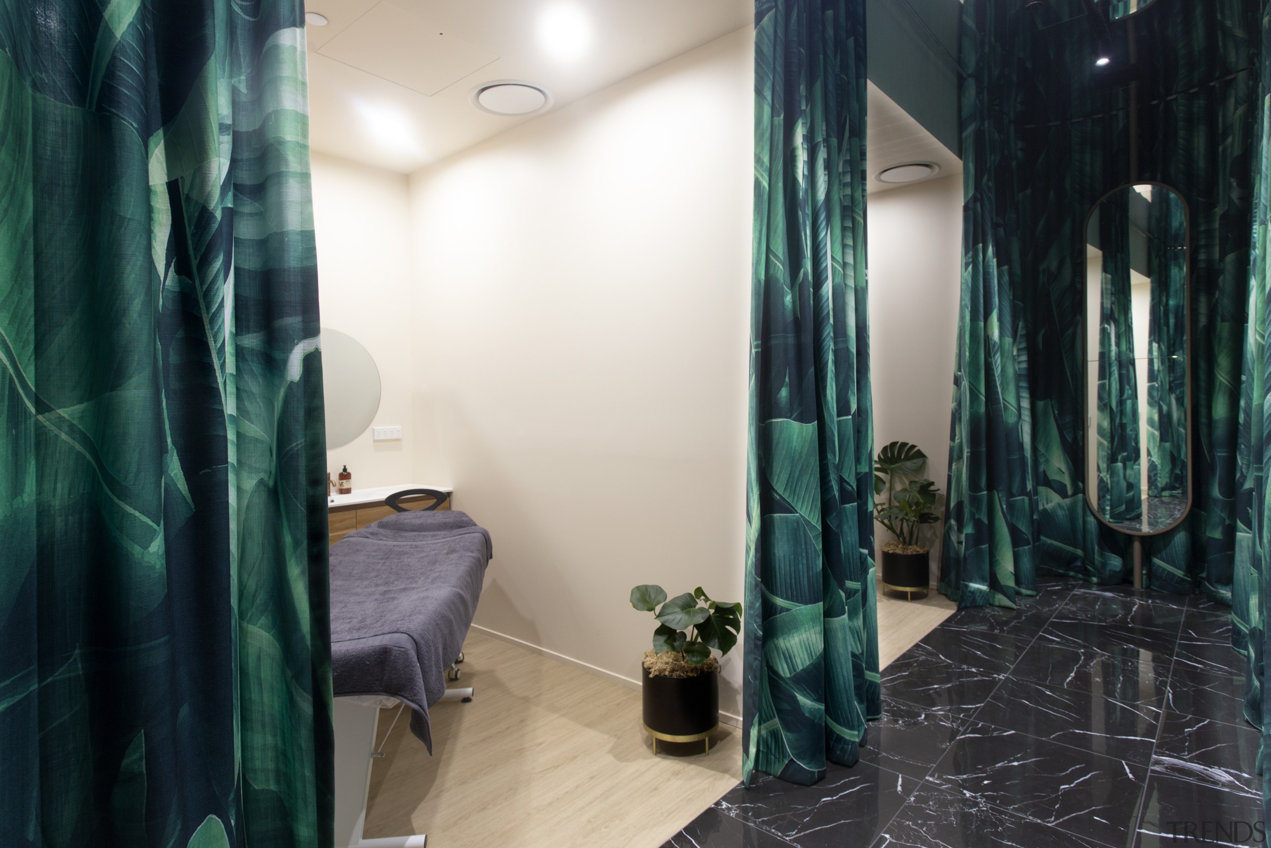 Treatment rooms are designed to evoke warmth, with architecture, building, ceiling, curtain, floor, furniture, green, house, interior design, property, real estate, room, textile, tree, window treatment, black, white