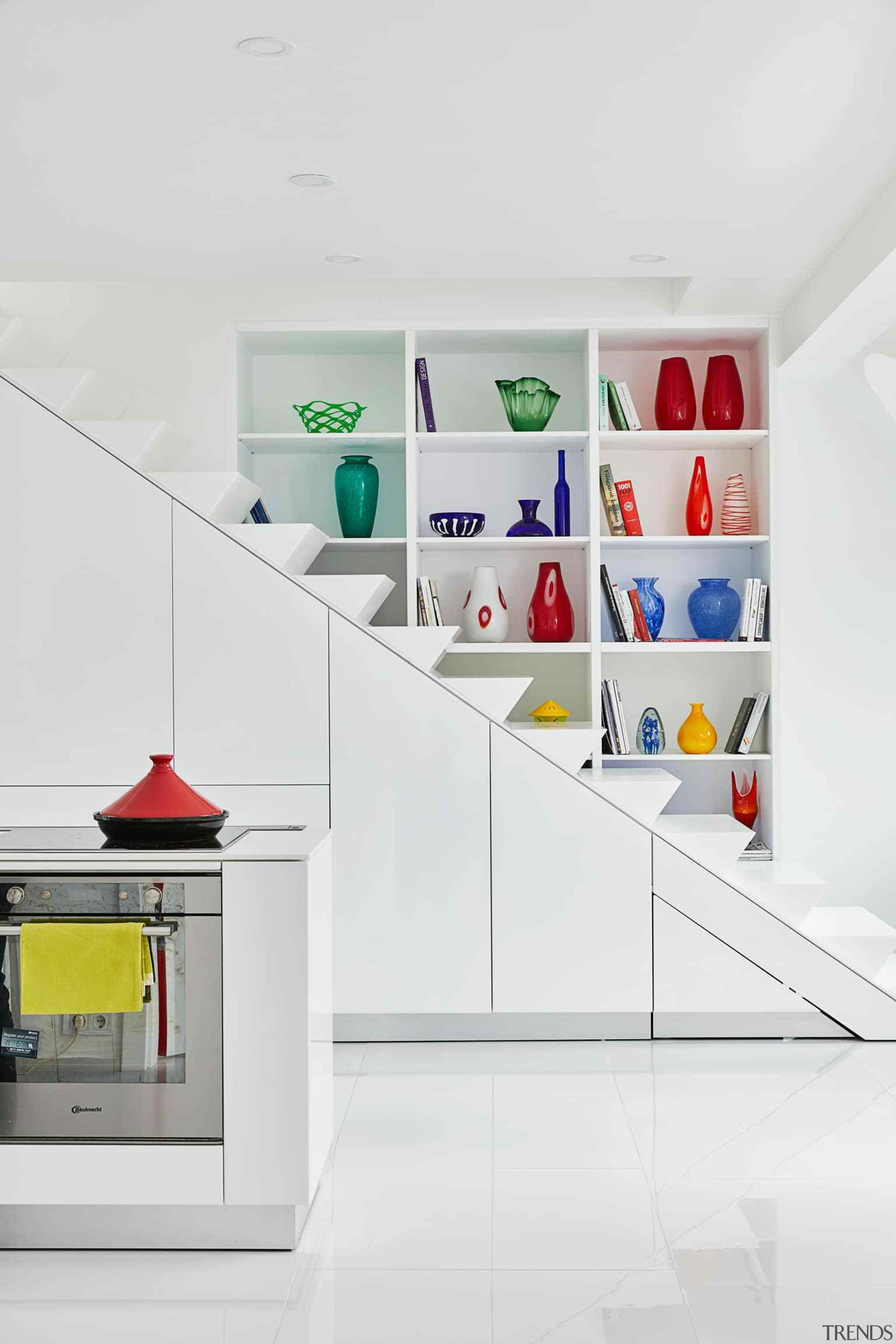 The cupboards under the stairs hold kitchen appliances furniture, interior design, product, shelf, shelving, white