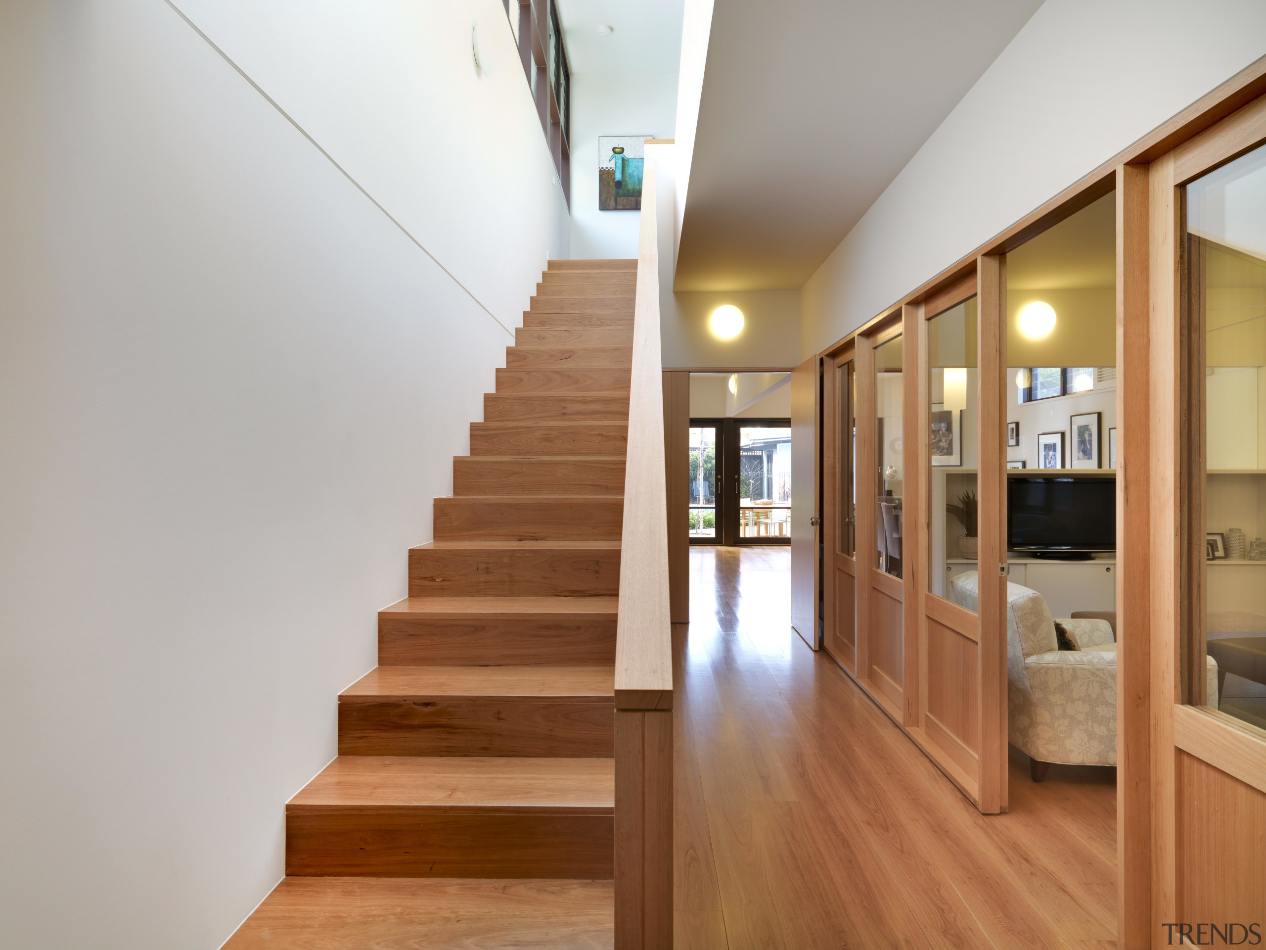 View of this contemporary remodeled lounge area - architecture, floor, flooring, handrail, hardwood, home, house, interior design, real estate, stairs, wood, wood flooring, gray