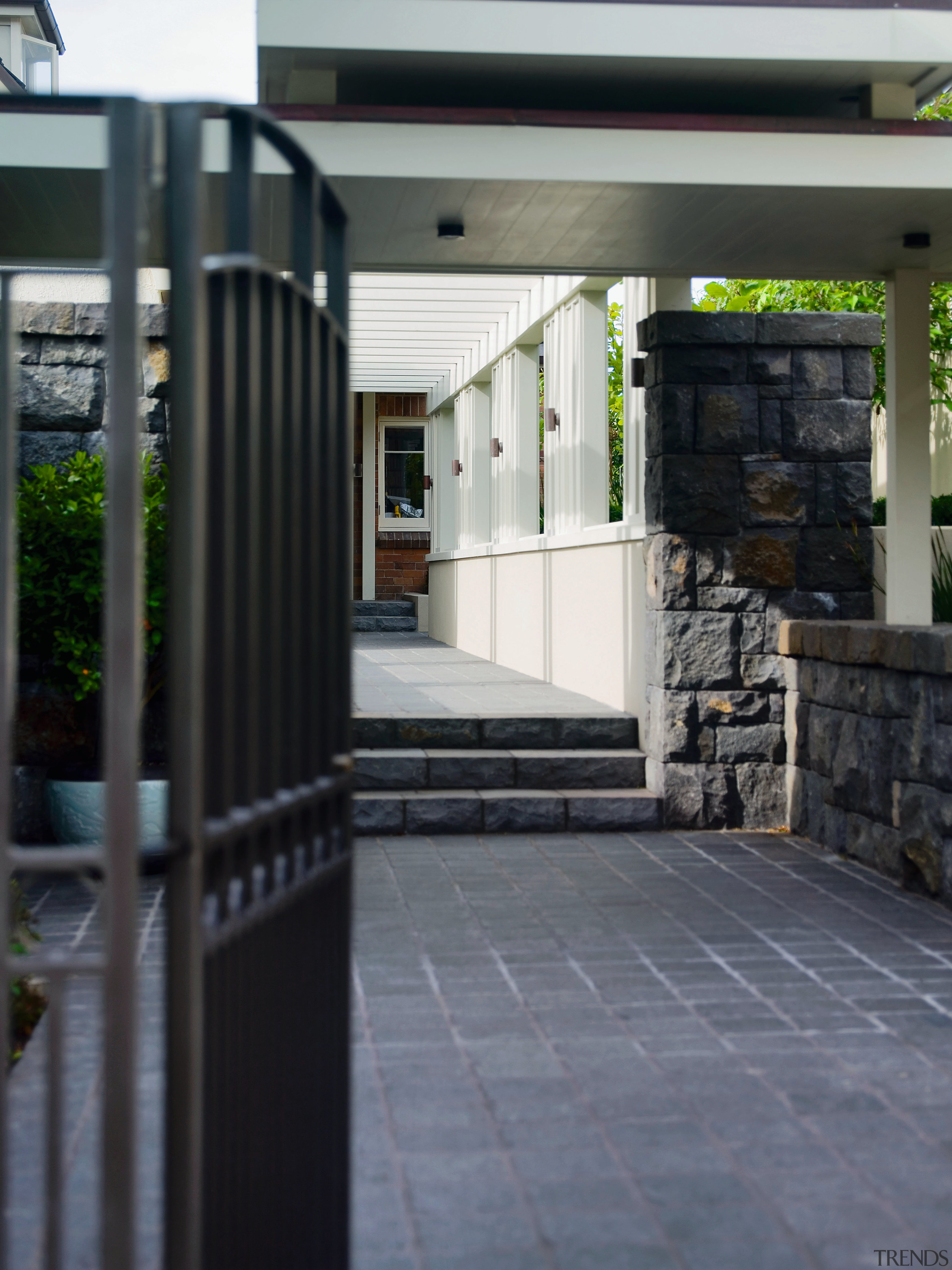 A view of the landscaping done by Space floor, outdoor structure, walkway, black, gray
