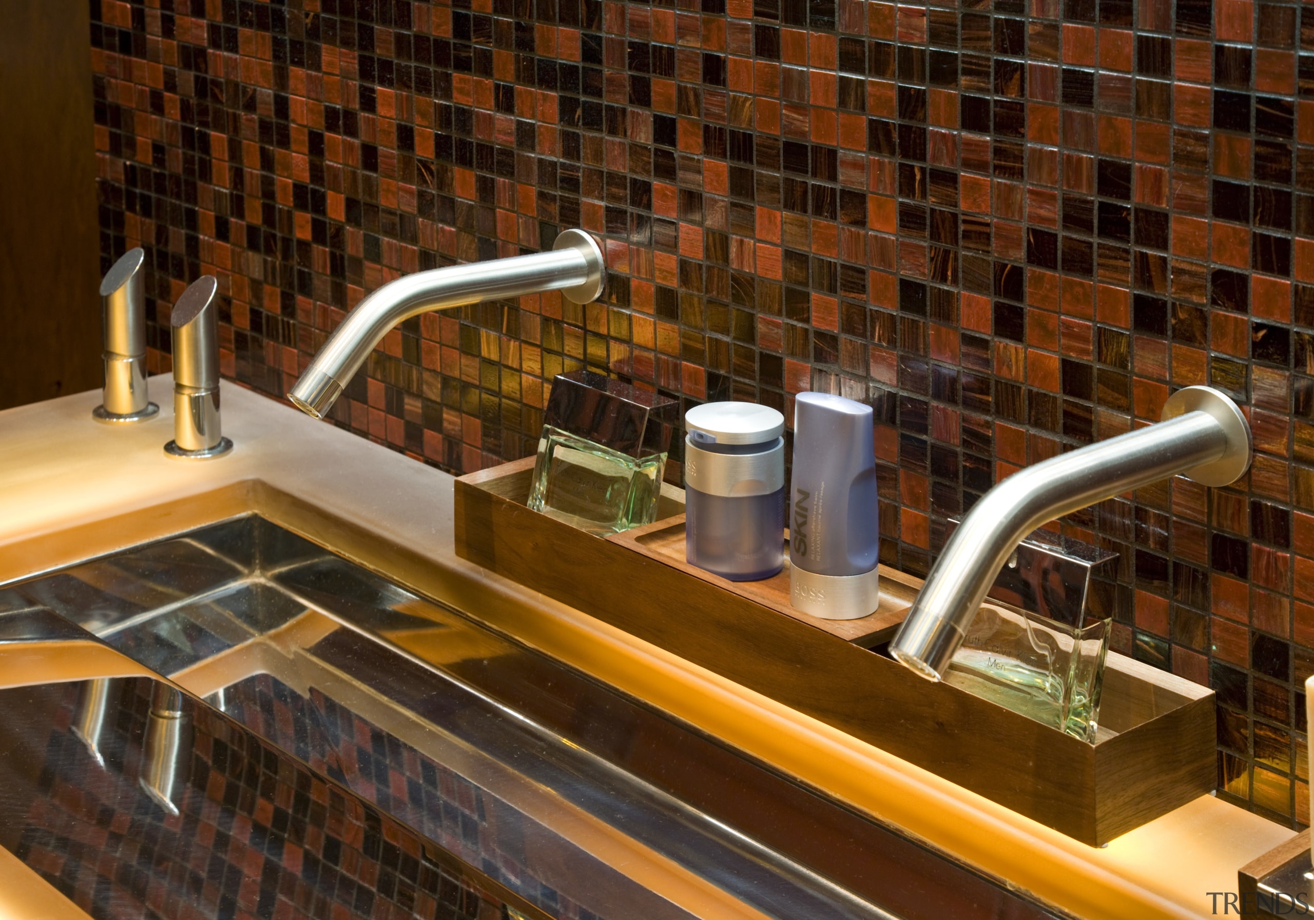 View of the master bathroom which features extensive countertop, flooring, brown