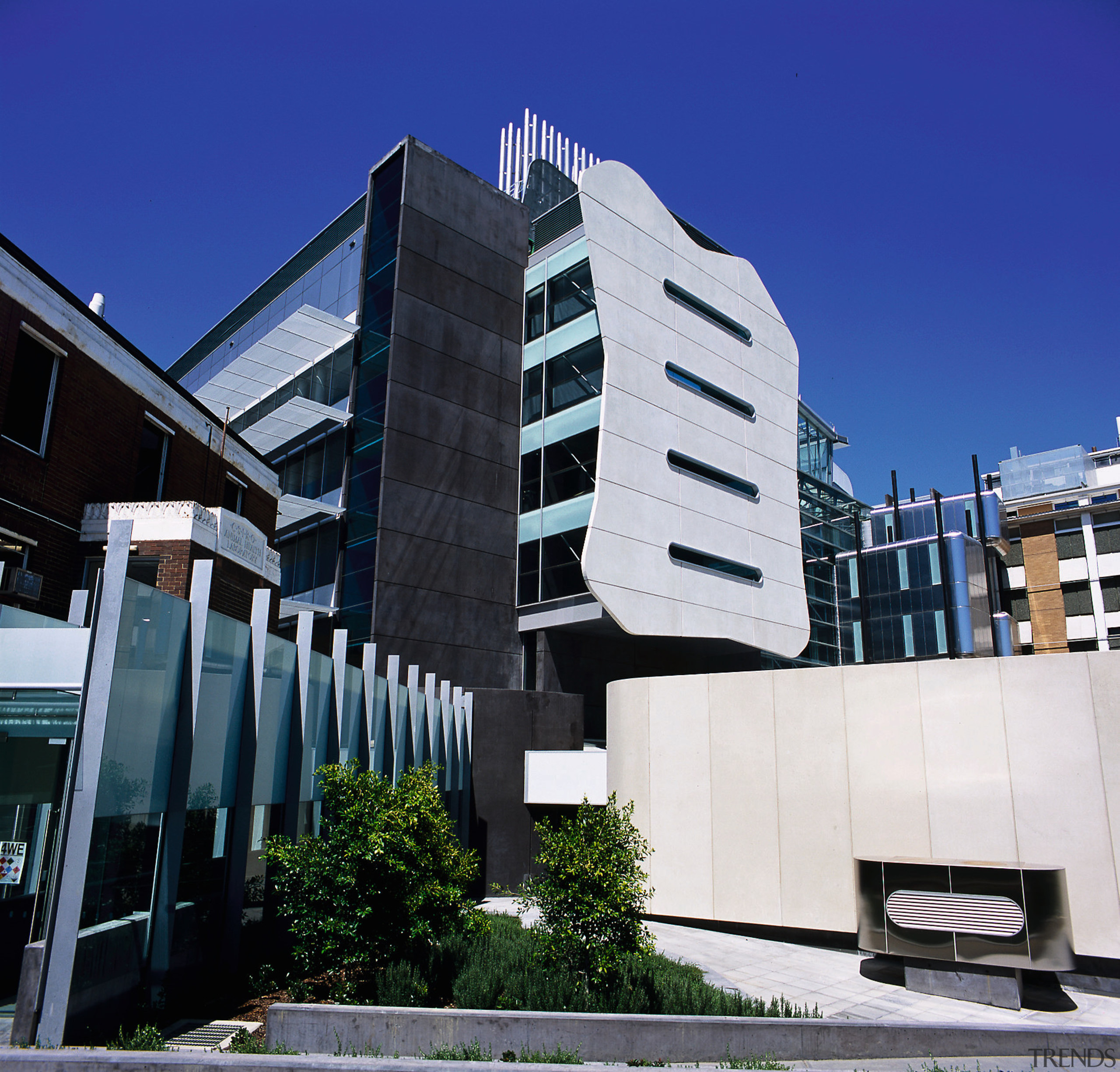 Exterior view of research centre showing concrete end apartment, architecture, building, city, commercial building, condominium, corporate headquarters, daytime, facade, headquarters, house, metropolis, metropolitan area, mixed use, neighbourhood, property, real estate, residential area, sky, blue, black