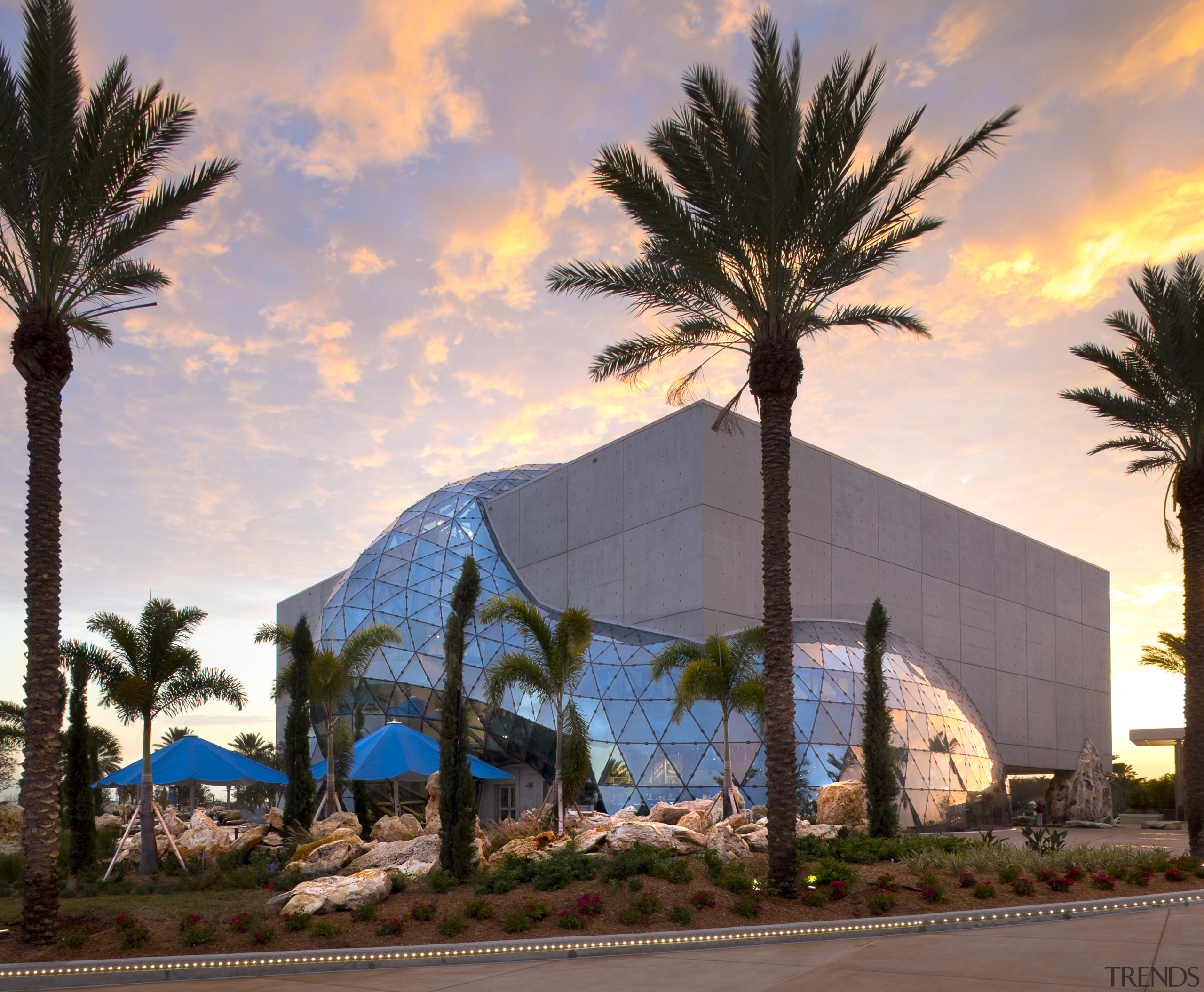 View of new art museum designed to house arecales, building, evening, home, hotel, palm tree, plant, property, real estate, resort, sky, tourist attraction, tree, vacation, gray