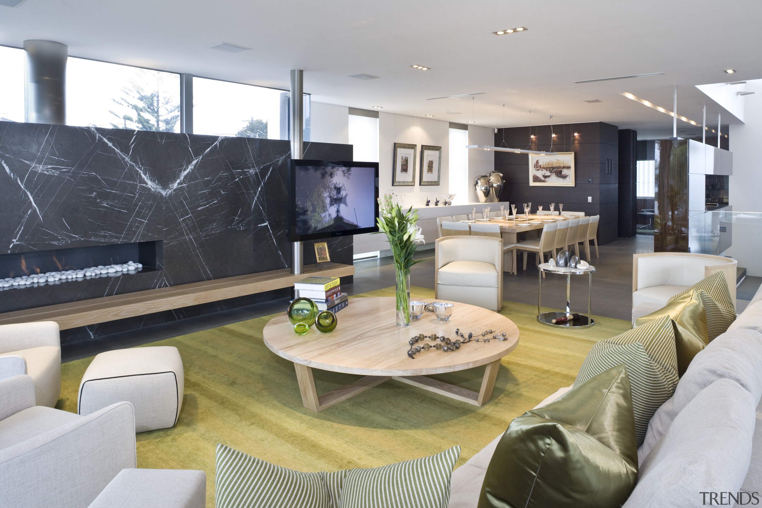 View of the main living area which features furniture, interior design, living room, table, gray