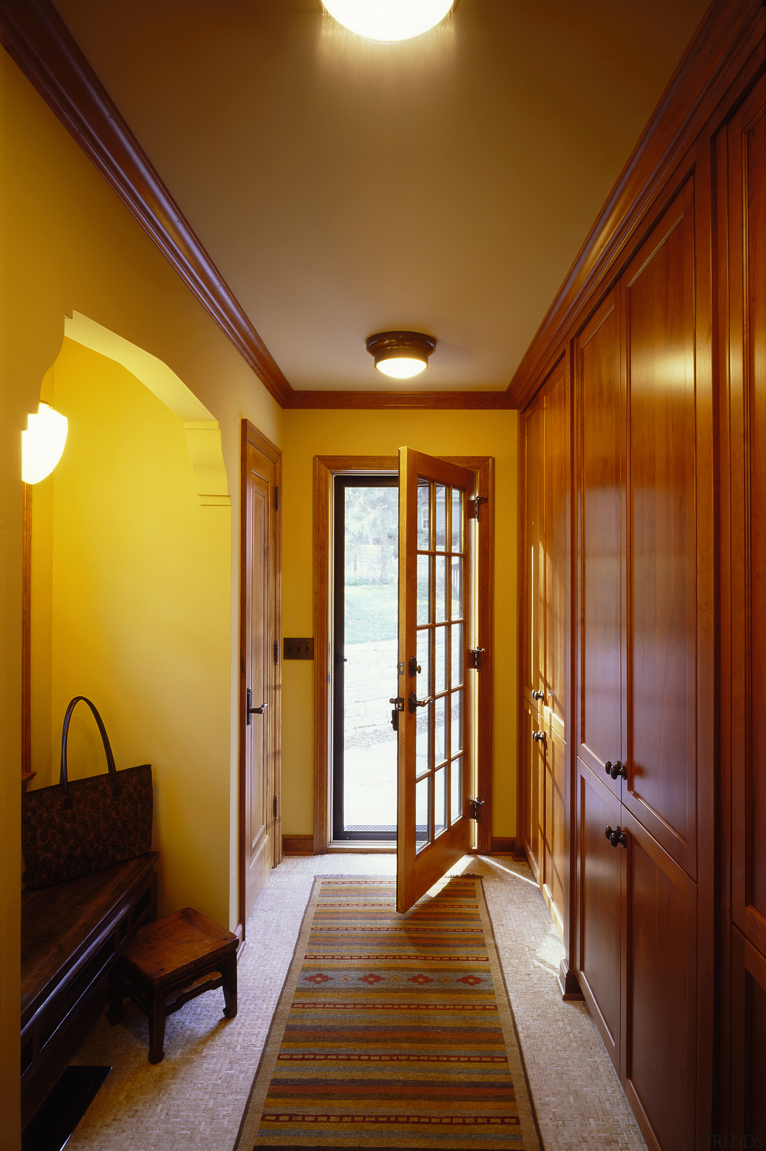 View of the front entrance - View of apartment, architecture, ceiling, daylighting, door, estate, floor, hall, hardwood, home, house, interior design, lighting, real estate, room, wall, window, wood, brown