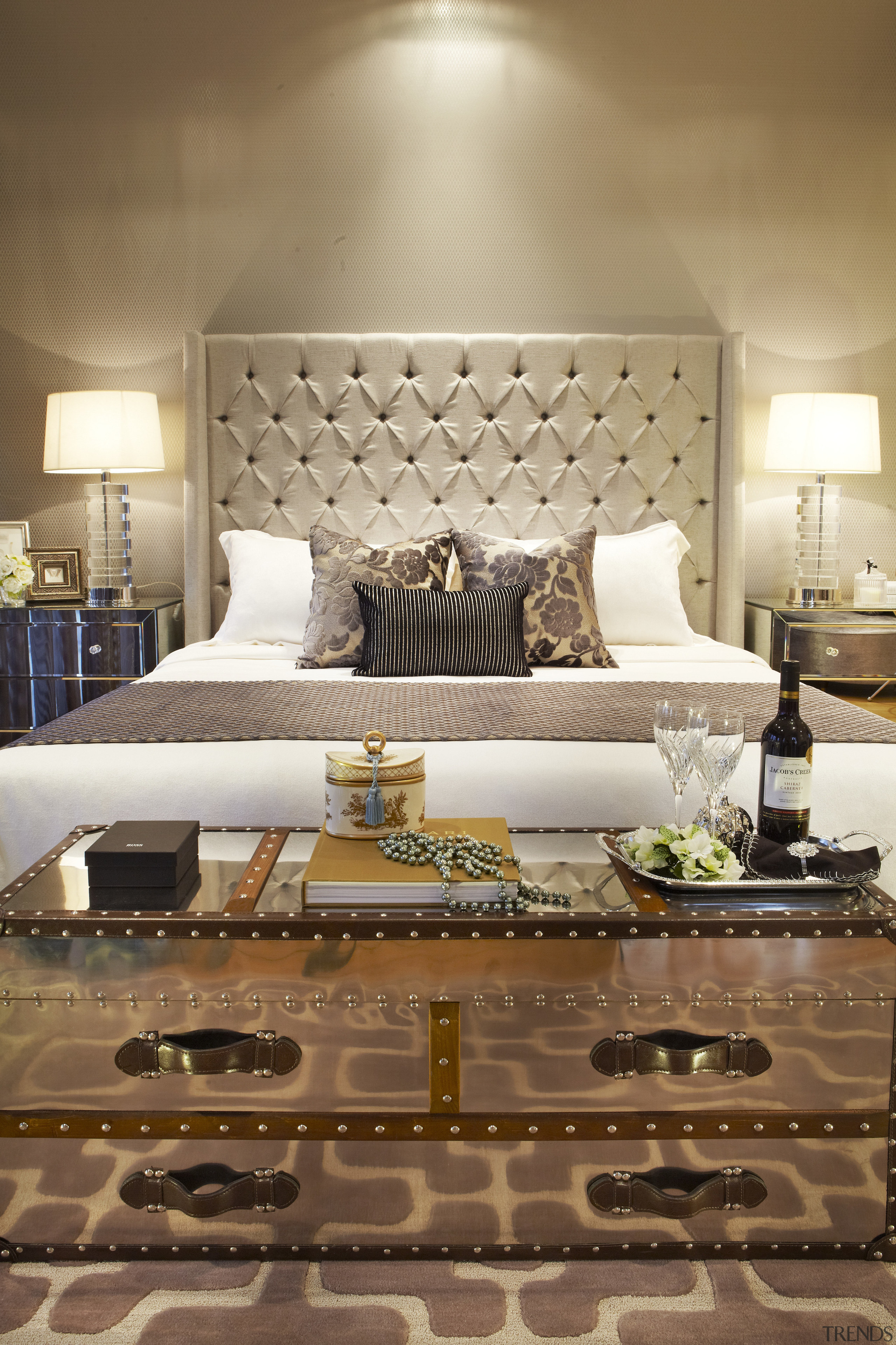 Bedroom with white bedspread and light beige head bed, bed frame, bedroom, ceiling, floor, flooring, furniture, home, interior design, living room, mattress, room, suite, brown