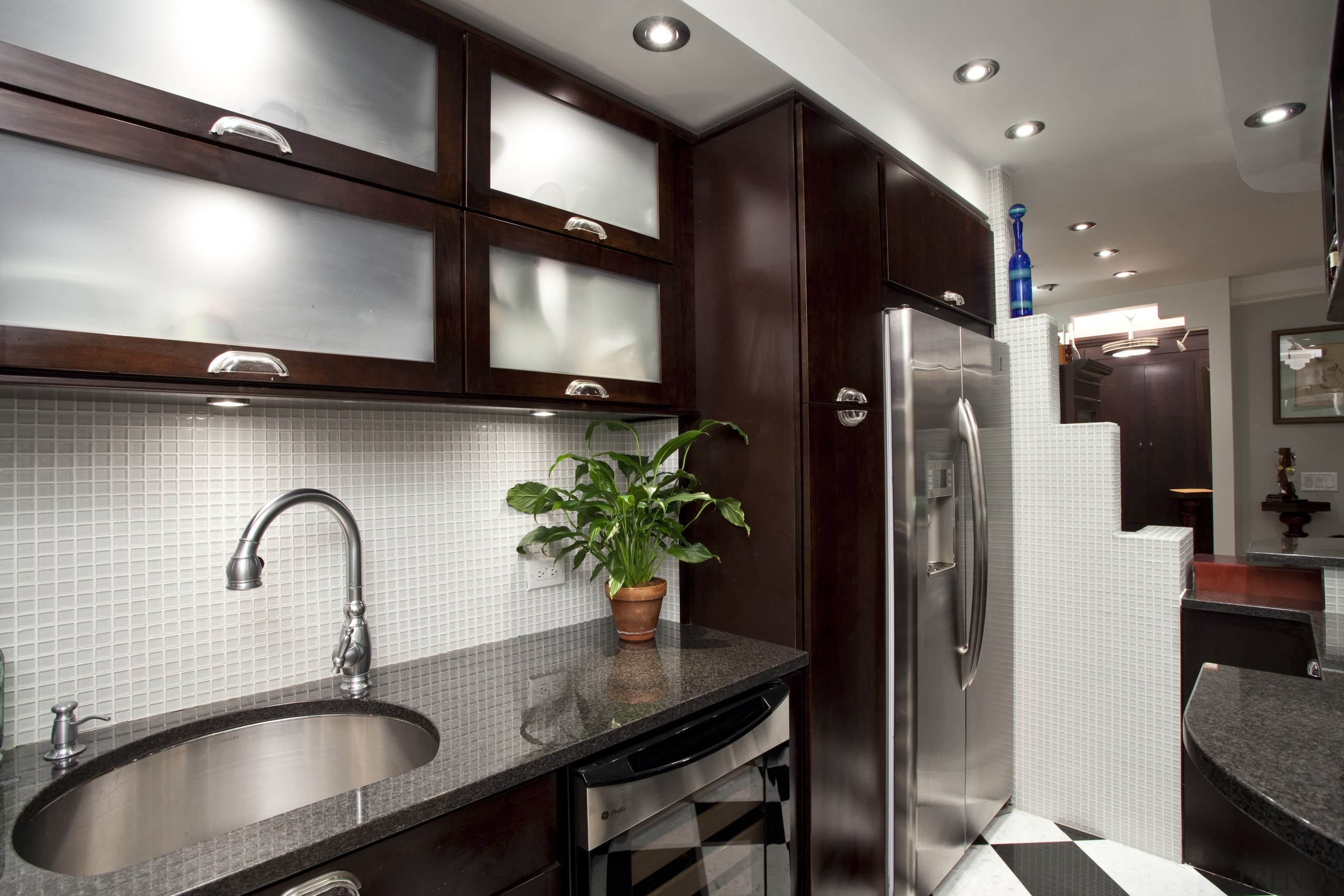 View of kitchen in Art-Deco styled apartment building, bathroom, ceiling, countertop, interior design, kitchen, room, black, white, gray