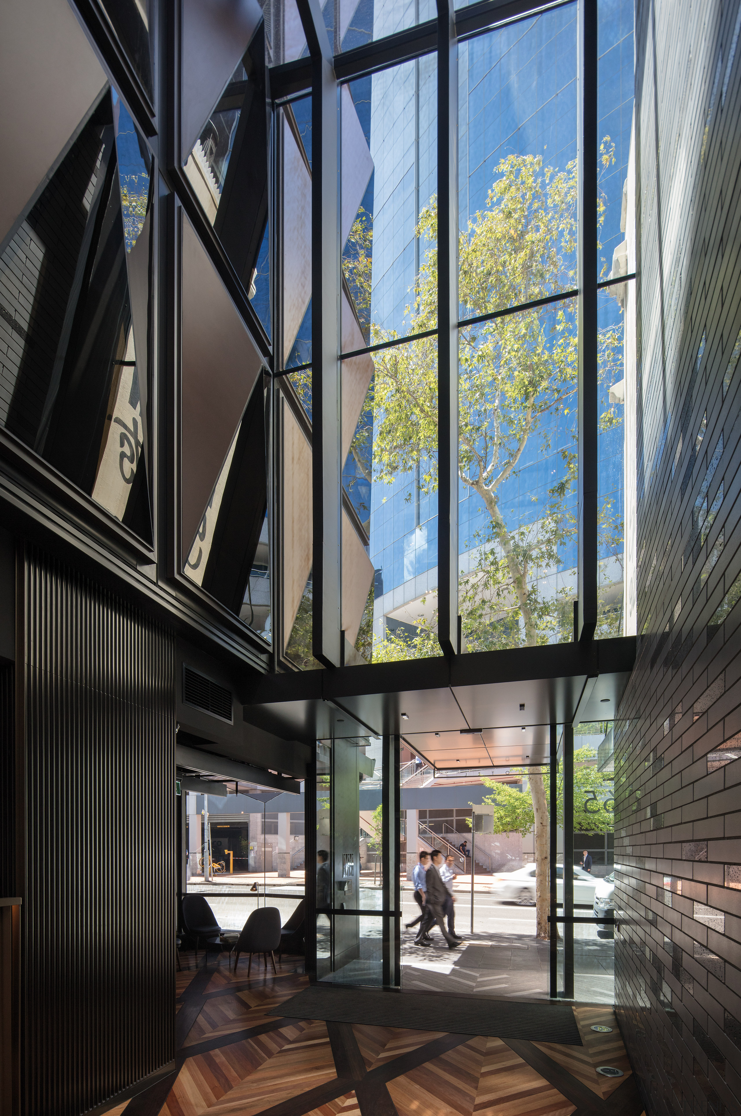Fitzpatrick &amp; Partners designed a soaring entry lobby apartment, architecture, building, daylighting, facade, glass, home, house, interior design, window, black, gray