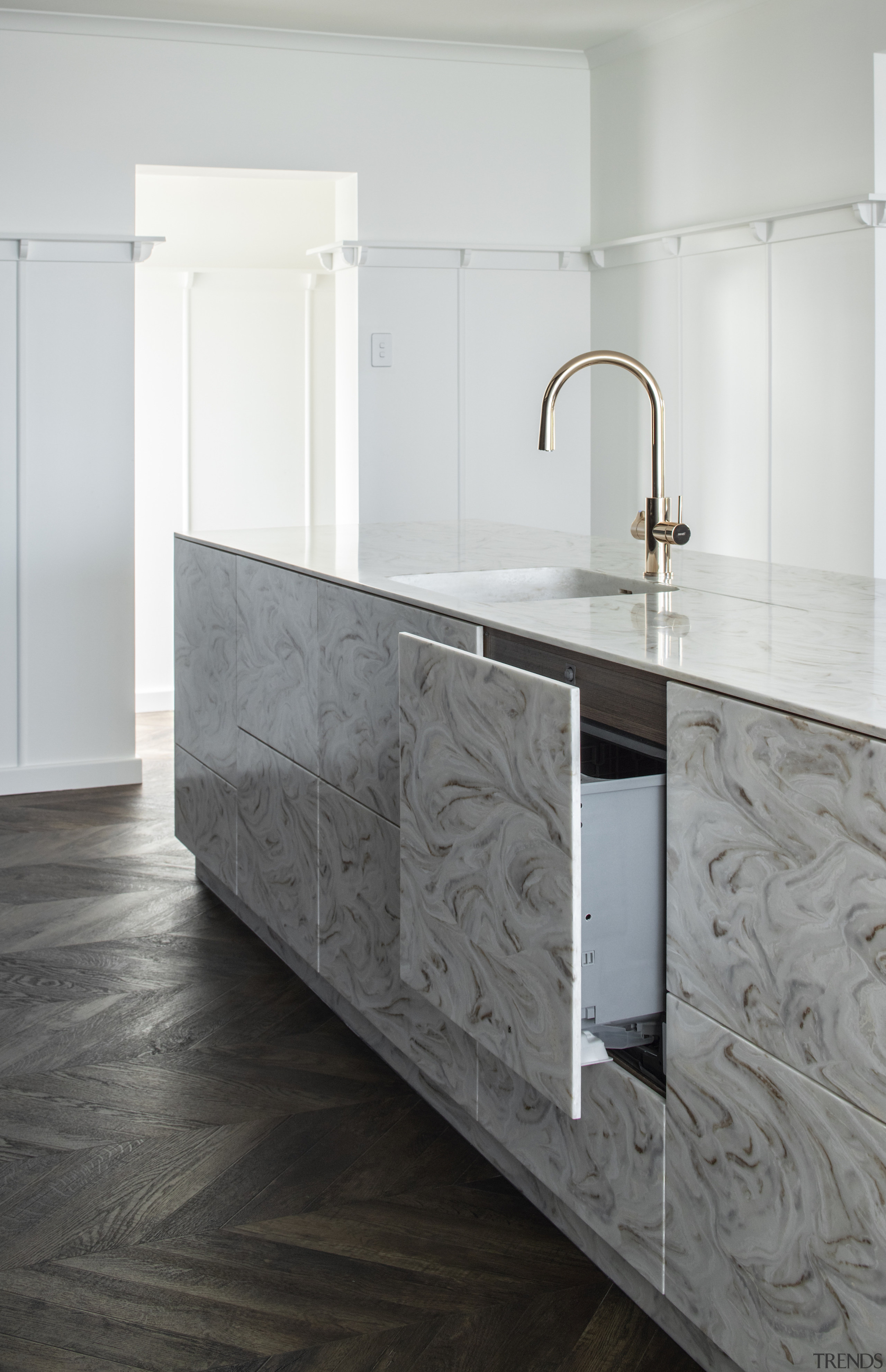 This kitchen's exotic reversed Corian Witch Hazel surface 