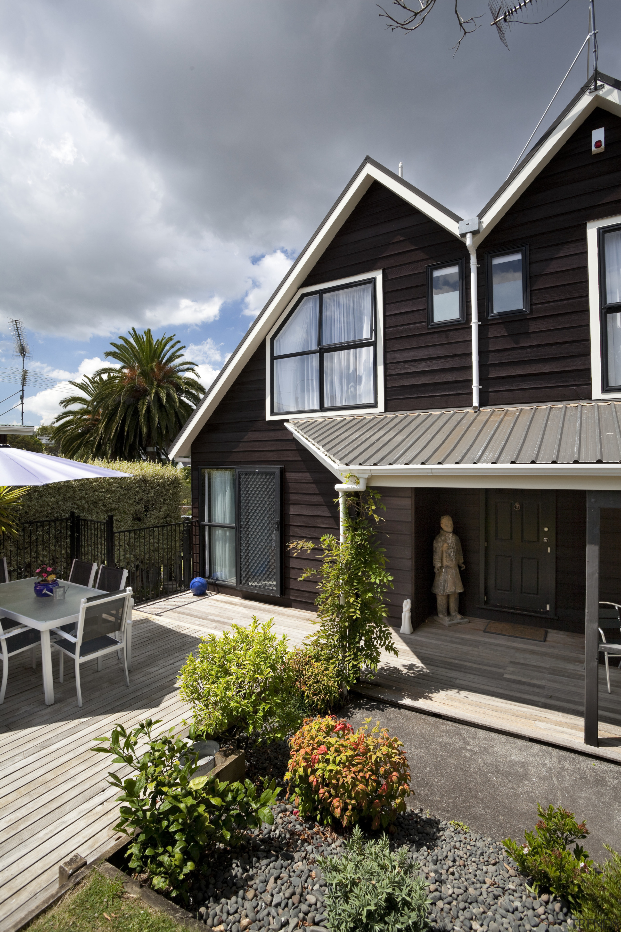 View of brown timber house with small front cottage, estate, facade, home, house, neighbourhood, property, real estate, residential area, roof, siding, suburb, walkway, window, gray, black