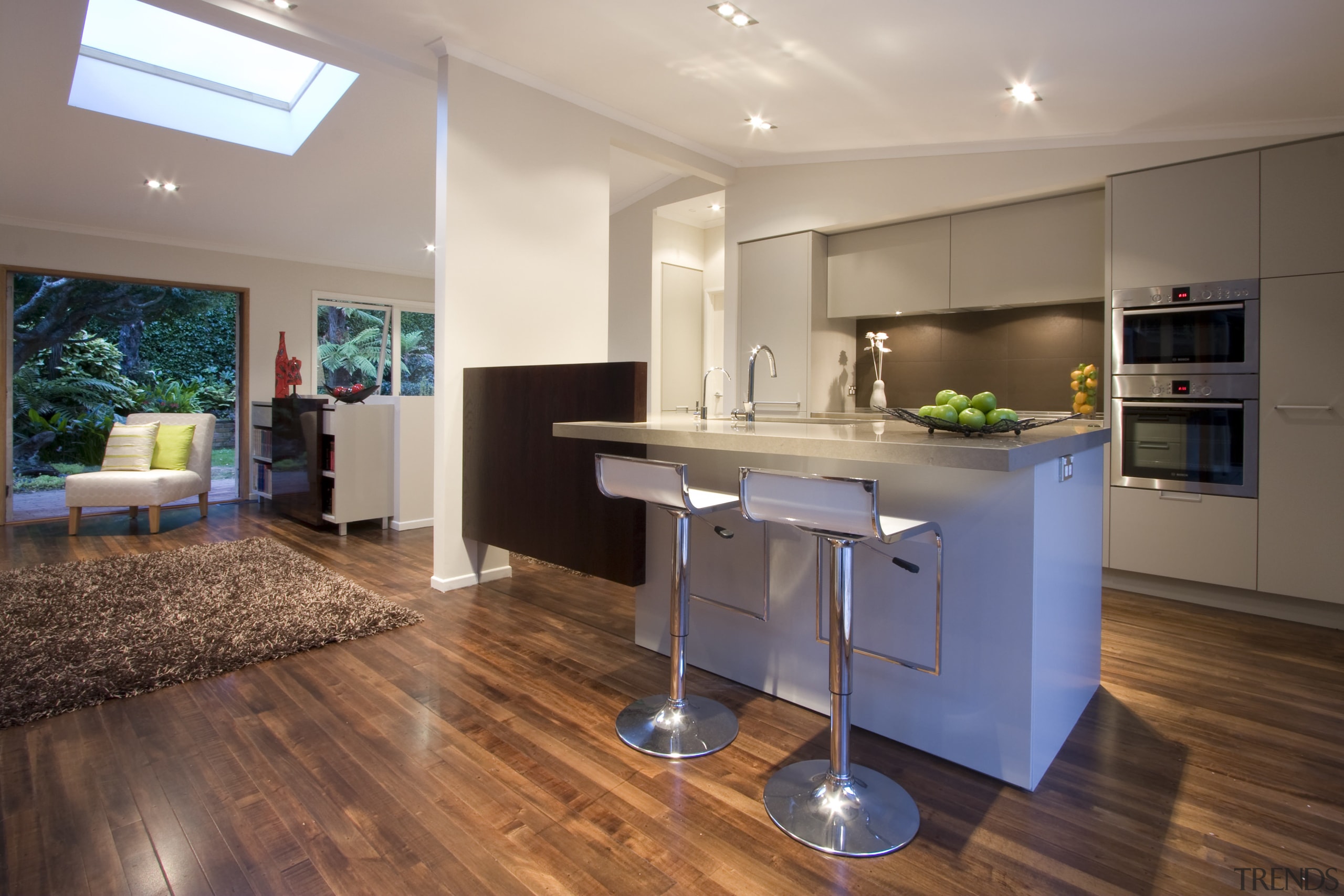 View of a kitchen designed by Toni Roberts countertop, floor, flooring, hardwood, home, interior design, kitchen, laminate flooring, living room, real estate, room, wood flooring, gray, brown