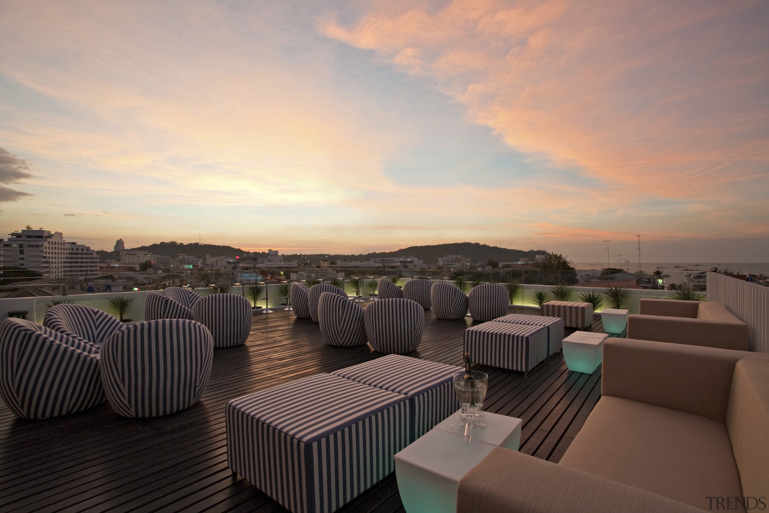 View of rooftop lounge. - View of rooftop evening, home, morning, real estate, sky, sunlight, sunset, gray, black