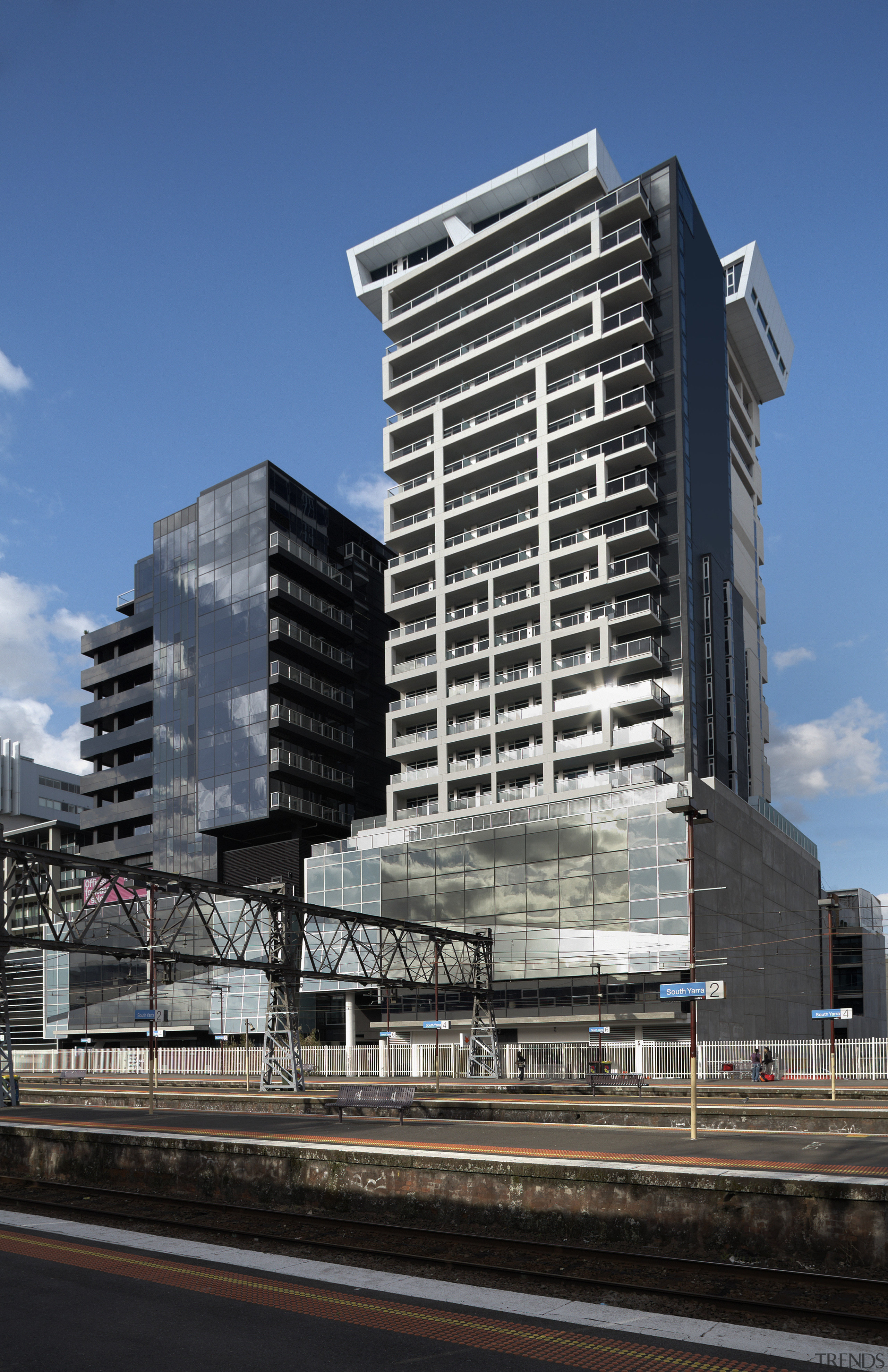 View of this contemporary apartment - View of architecture, brutalist architecture, building, city, commercial building, condominium, corporate headquarters, daytime, facade, headquarters, metropolis, metropolitan area, mixed use, residential area, sky, skyscraper, tower block, urban area, black