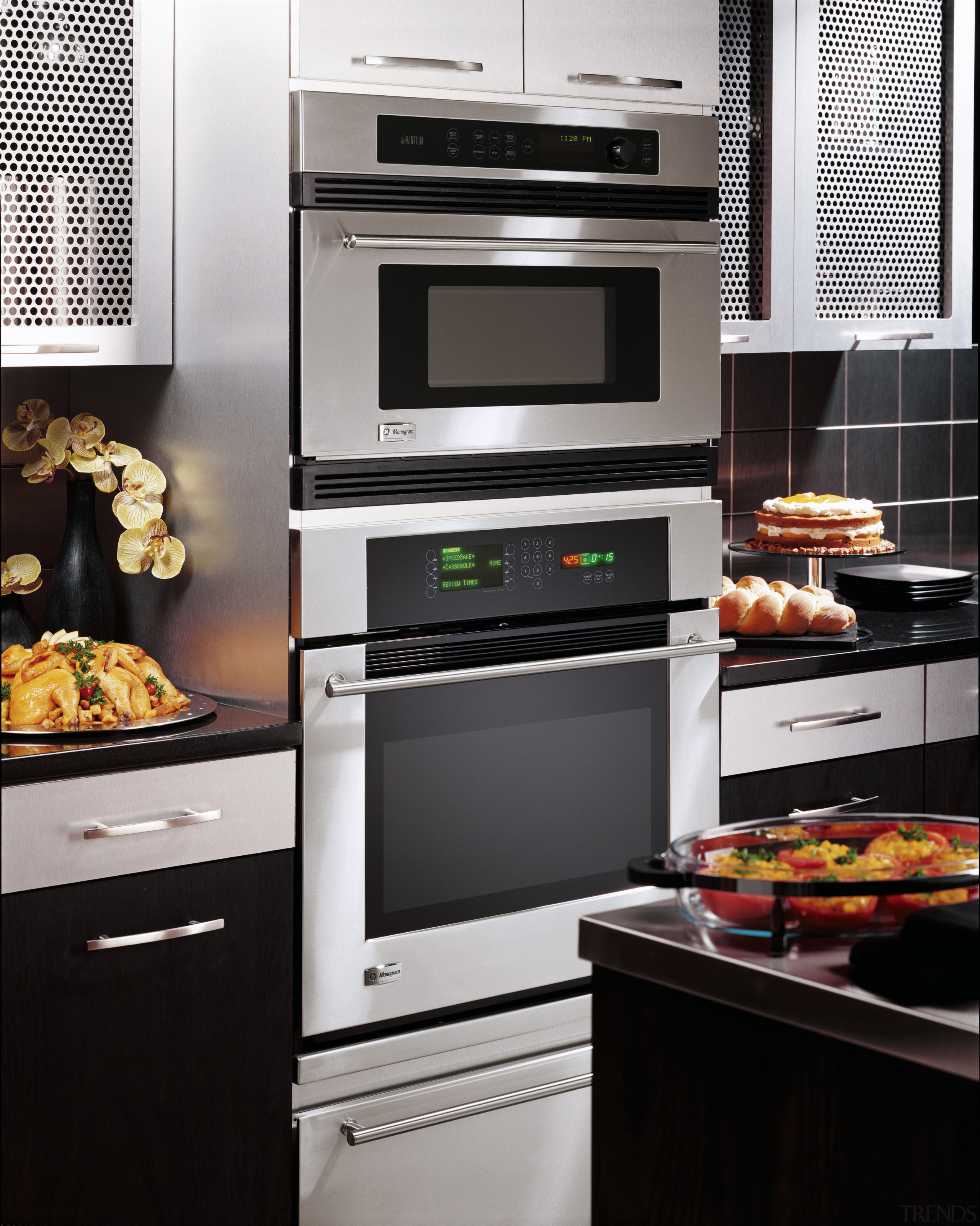 A view of  GE Monogram wall oven. countertop, gas stove, home appliance, kitchen, kitchen appliance, kitchen stove, major appliance, microwave oven, oven, black, gray