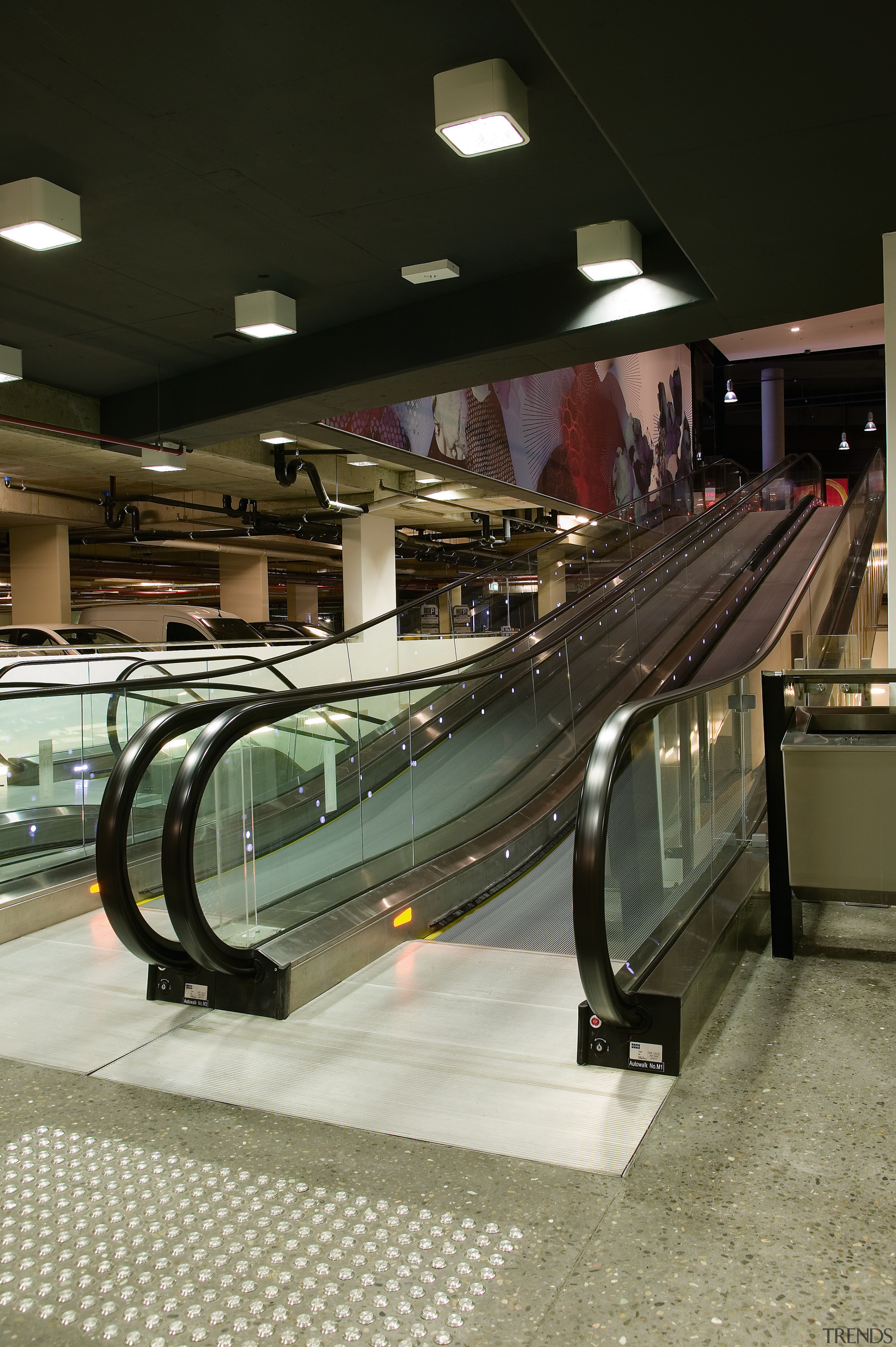 A view of the four moving escalator walkways escalator, glass, public transport, black