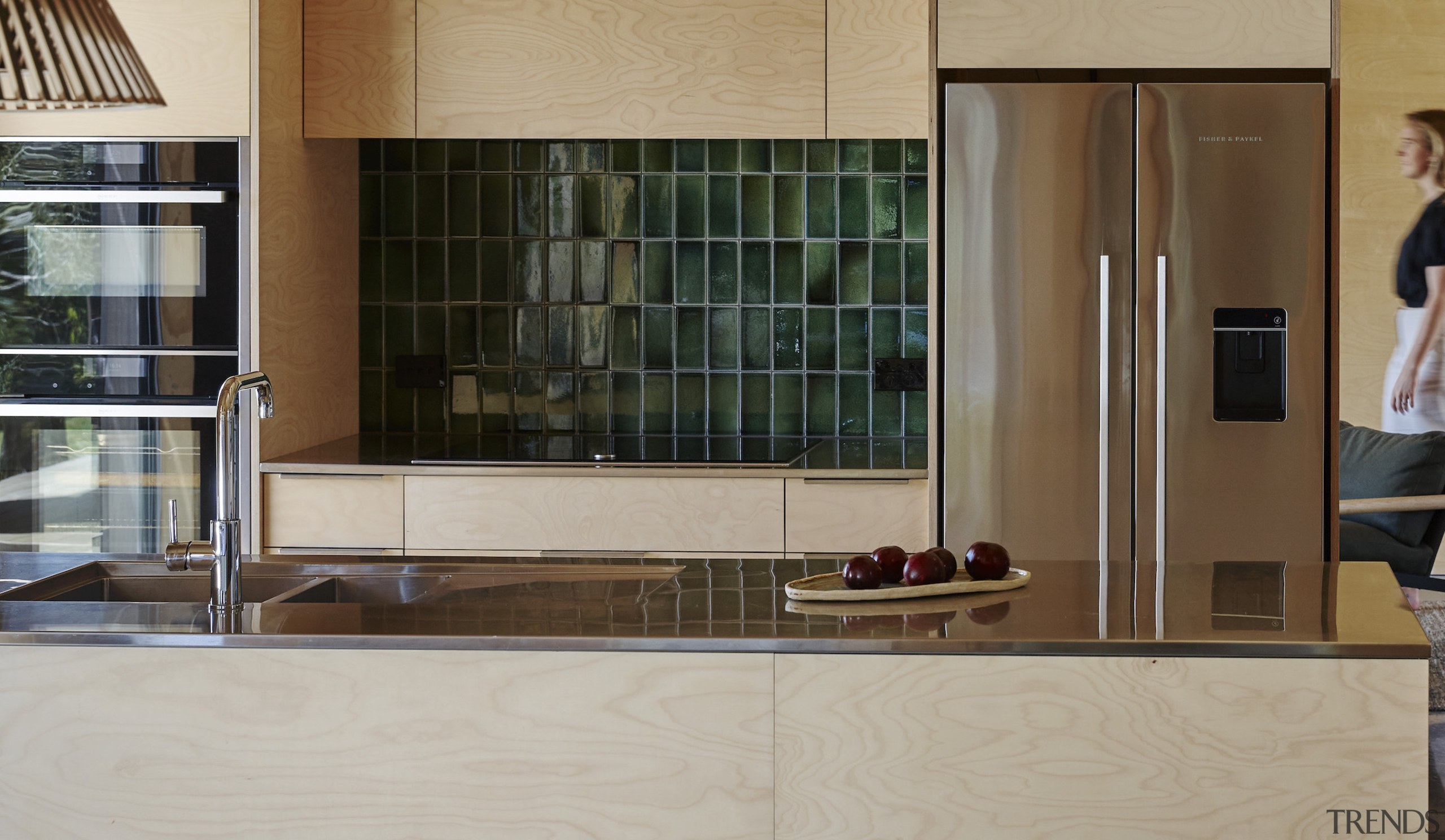 Birch plywood linings and cabinetry bring warmth to 