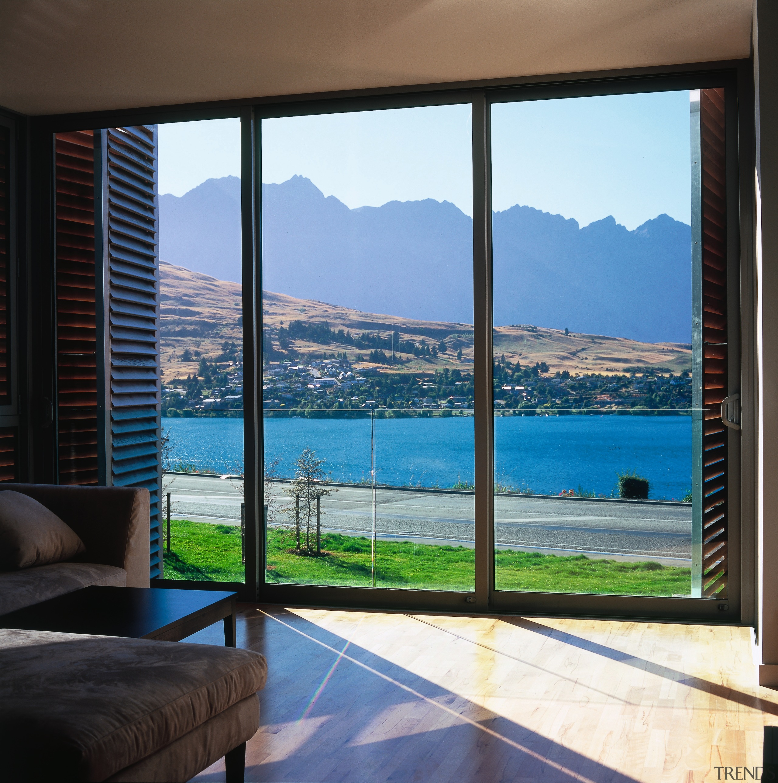 Large window with aluminium joinery and timber shutters, apartment, condominium, door, estate, home, interior design, property, real estate, sea, sky, window, window treatment, black