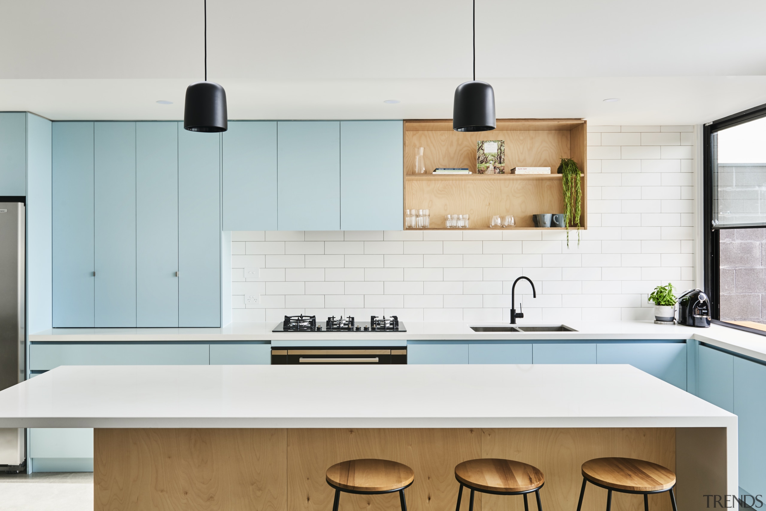 This colourful kitchen features a combination of laminate architecture, building, cabinetry, ceiling, countertop, floor, furniture, hardwood, home, house, interior design, kitchen, kitchen stove, material property, plywood, property, room, sink, tile, wood, white