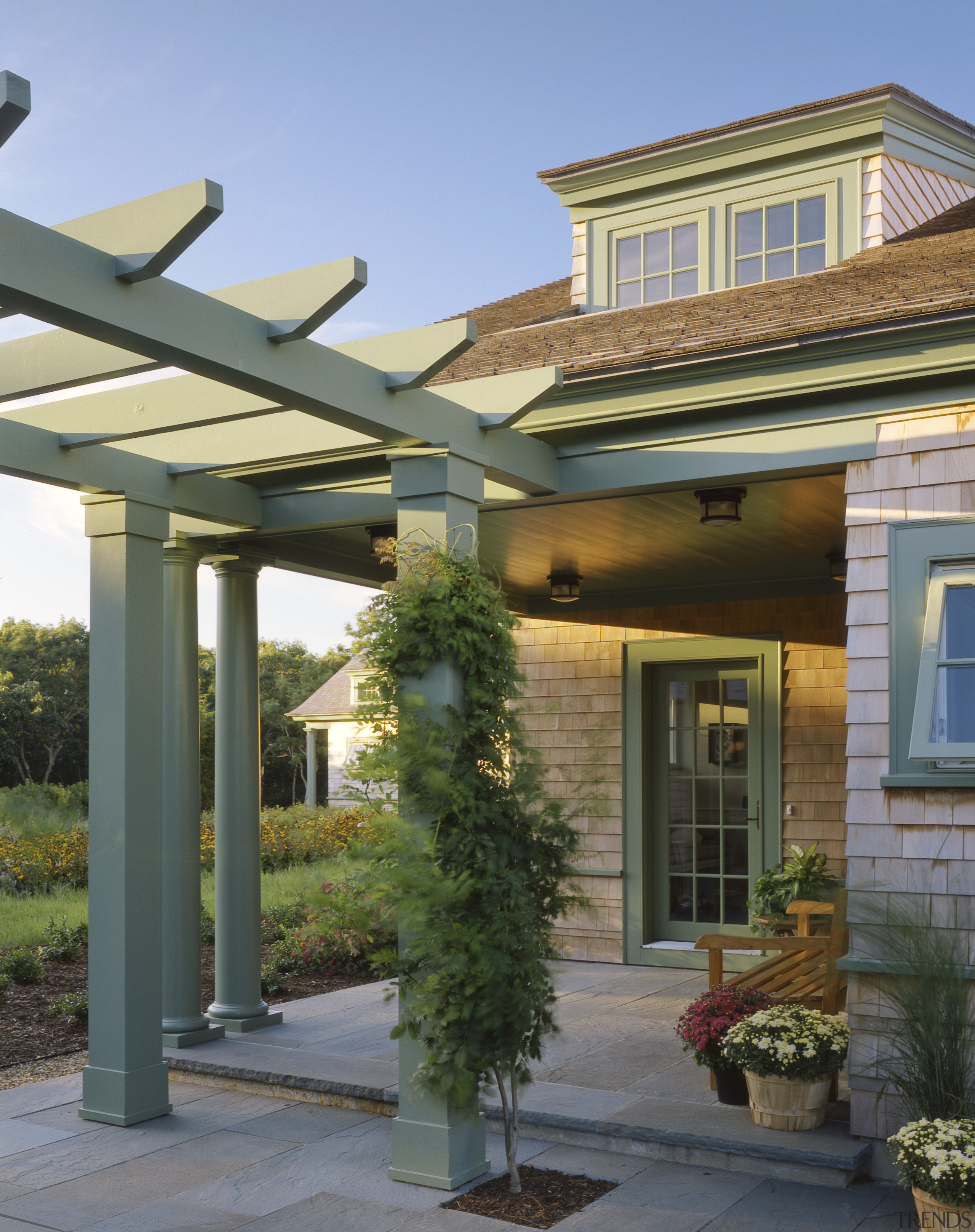 View of patio, shingle siding, shingle roof, slate, courtyard, home, house, outdoor structure, patio, porch, property, real estate, roof, gray