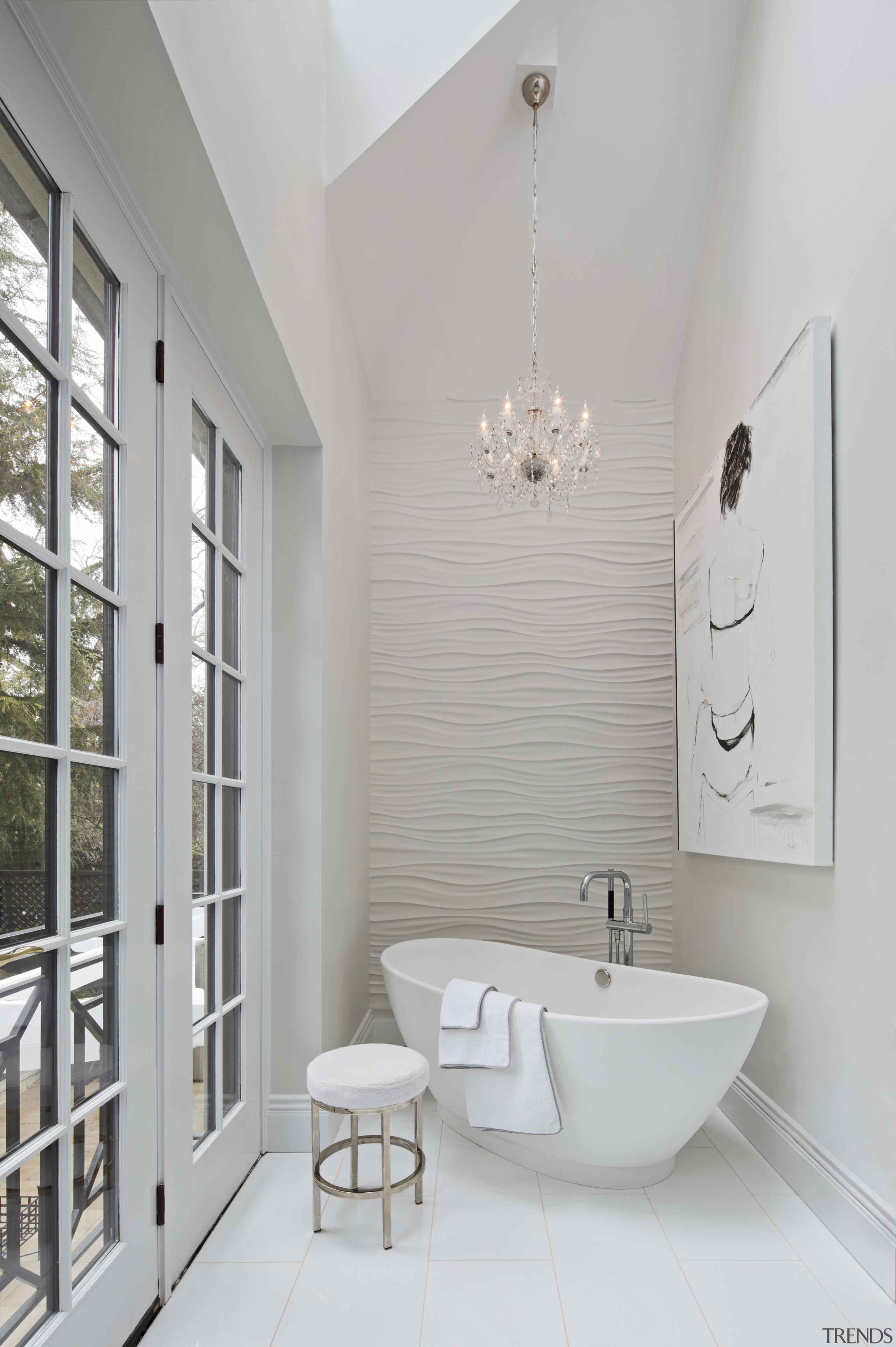 A sculptural freestanding tub sits beside the French bathroom, bathroom accessory, floor, home, interior design, plumbing fixture, product design, room, sink, tap, gray