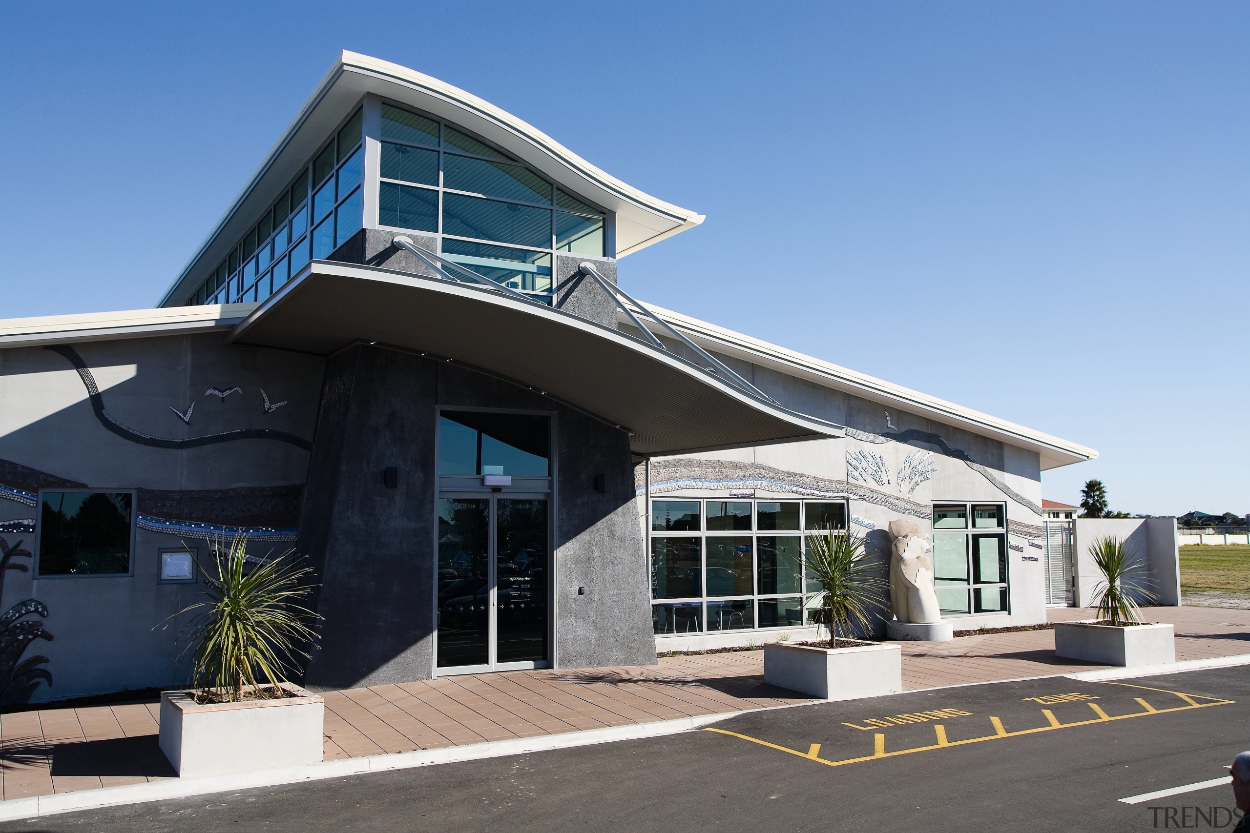 A view of the Papamoa Library designed by architecture, building, commercial building, corporate headquarters, house, real estate, teal, black