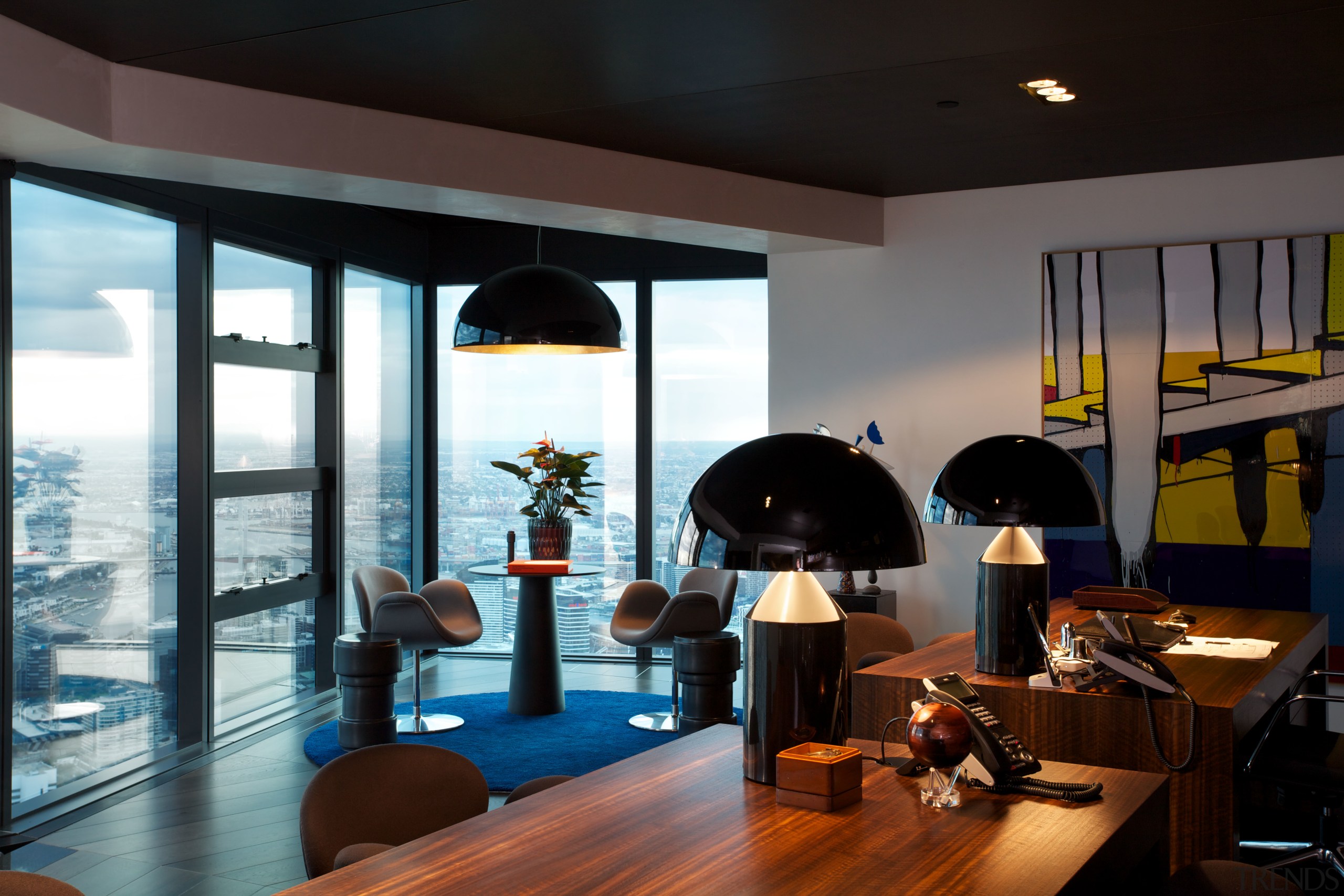 There are two desks in this study with interior design, room, black