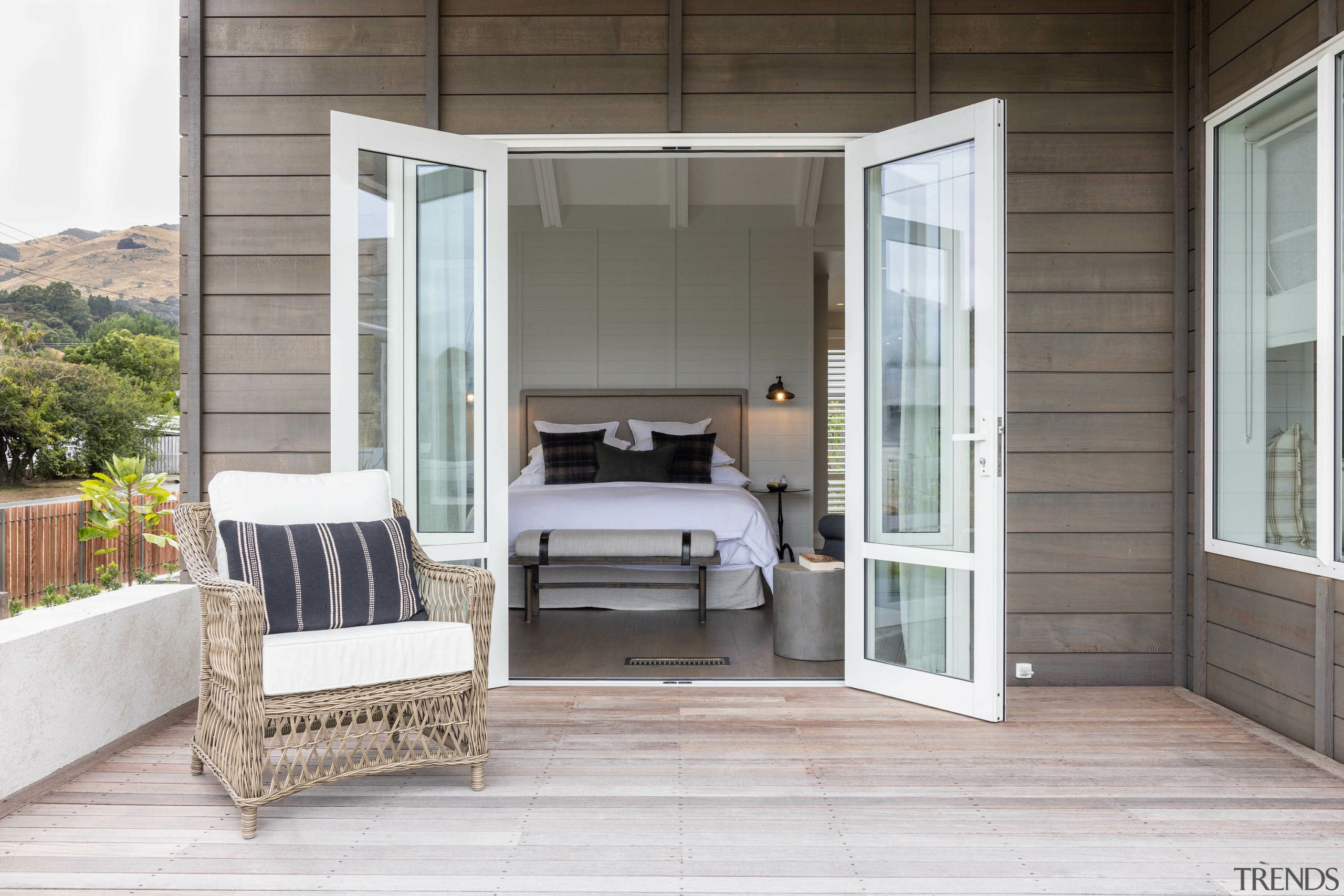 Bedroom seen from deck. - French accent by 