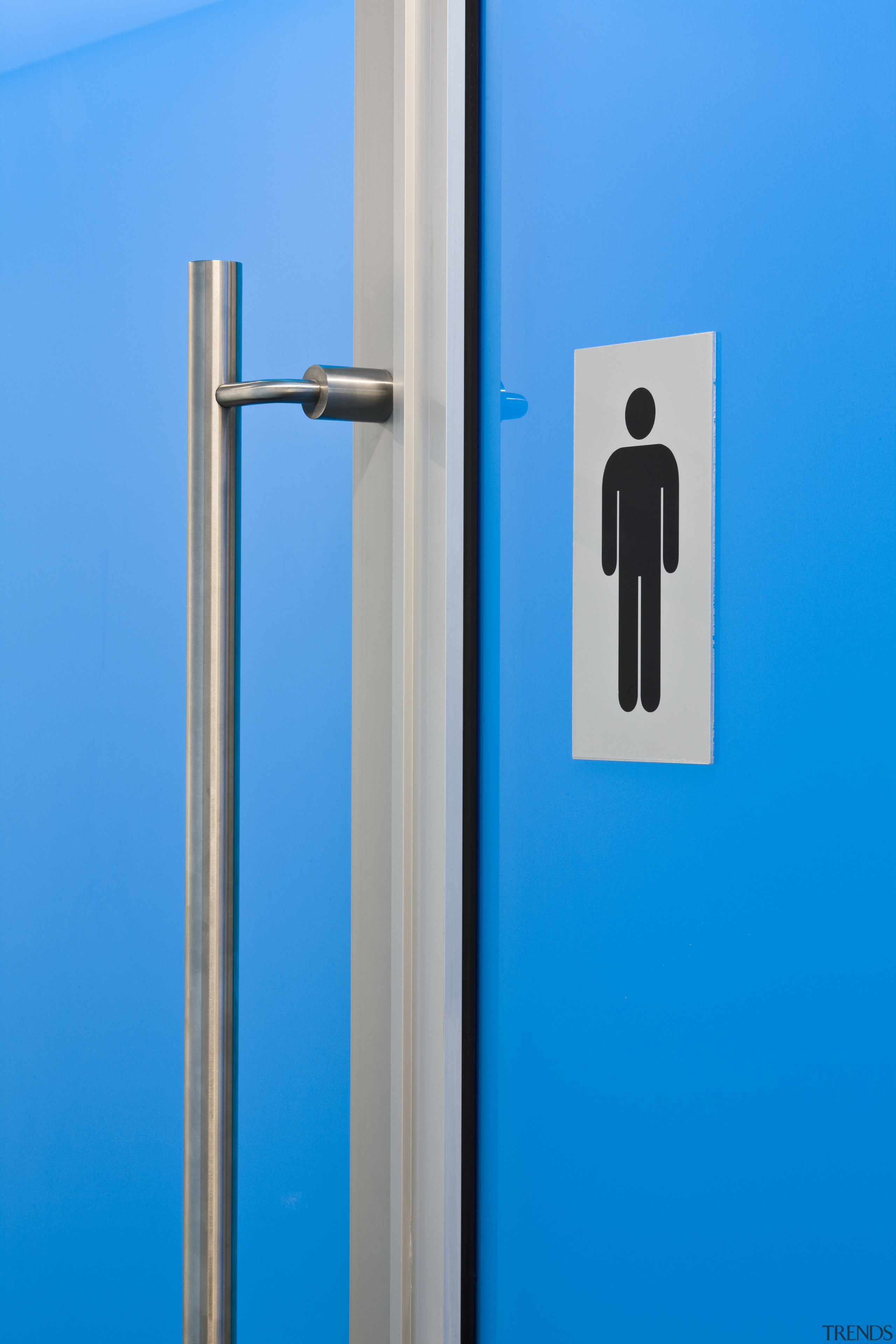 View of bathrooms inside the eco-friendly office building. door handle, product, product design, teal