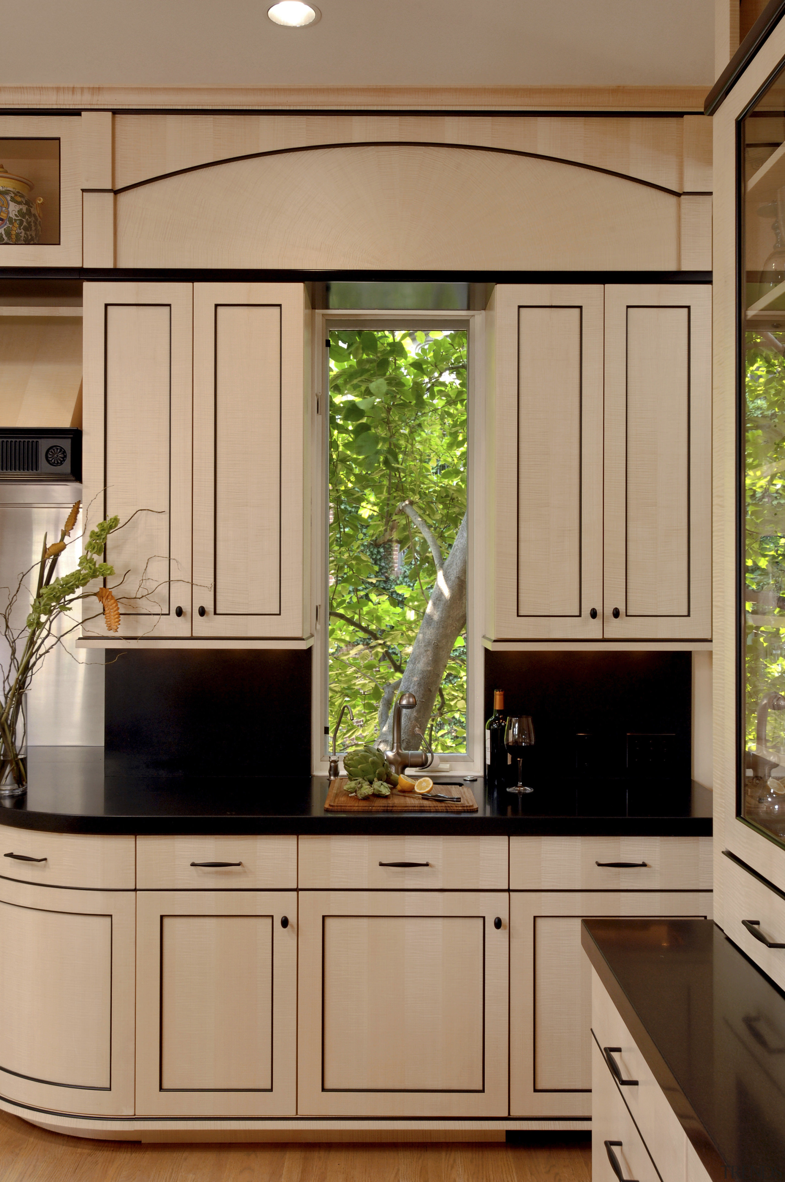 Designer Jennifer Gilmer, CKD, specified two islands for cabinetry, countertop, cuisine classique, home, interior design, kitchen, room, under cabinet lighting, window, orange