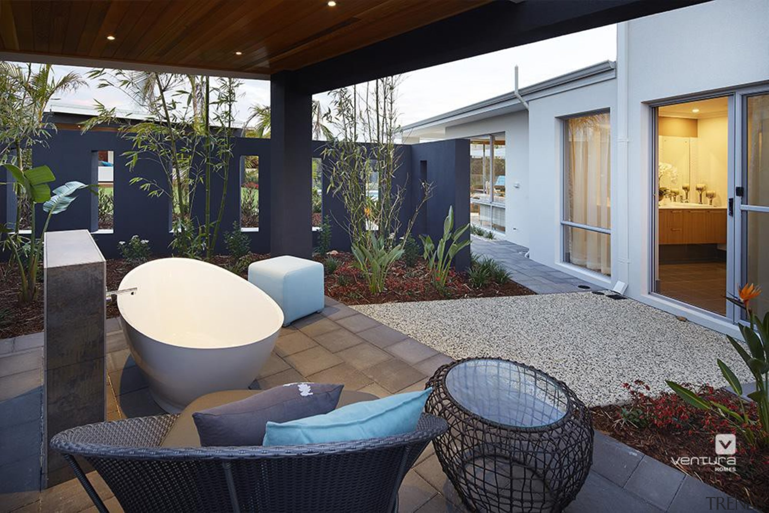 Backyard features outdoor bathtub opposite master bedroom. architecture, backyard, courtyard, estate, home, house, interior design, patio, property, real estate, window, black, gray