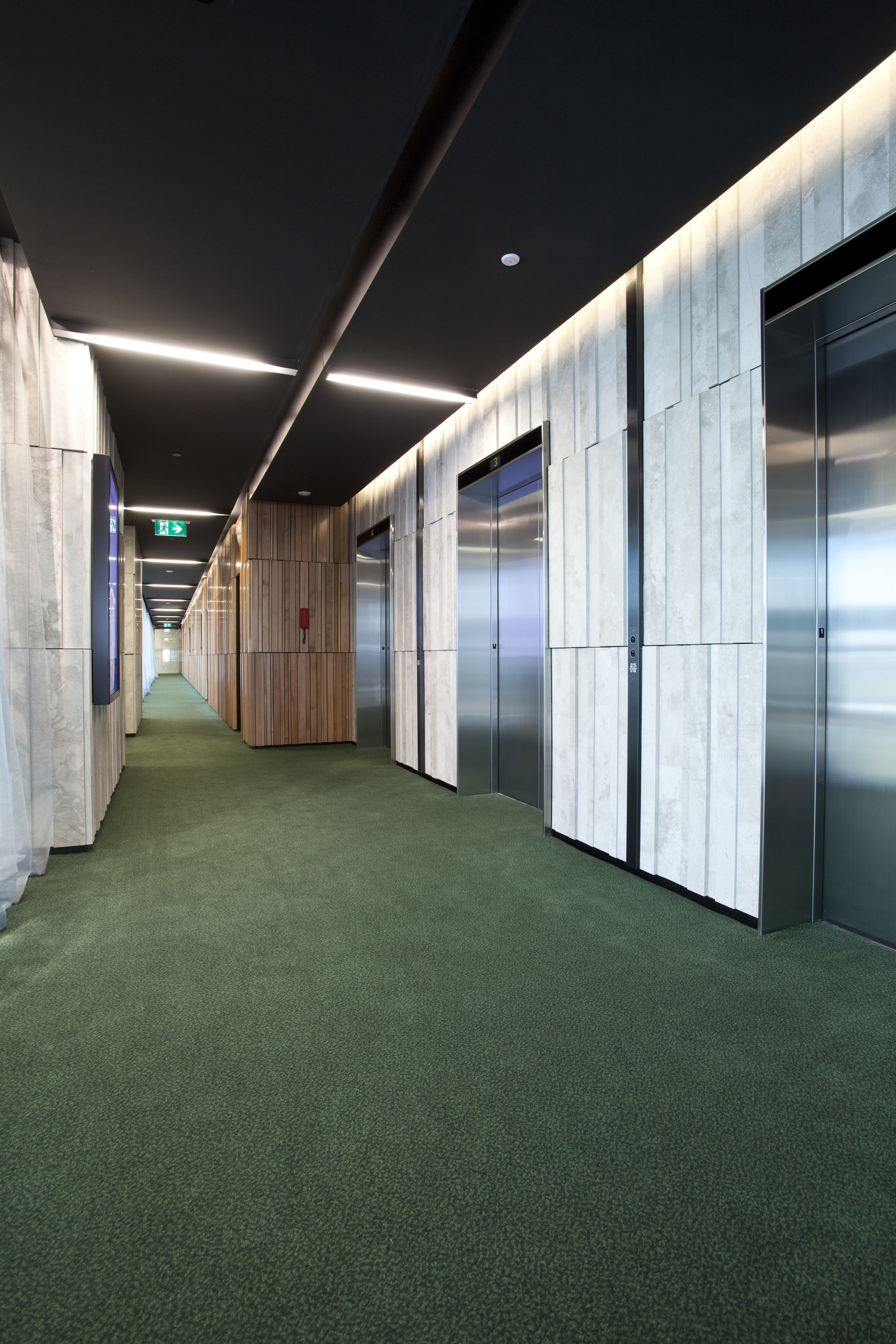 Interior of the Novotel Auckland Airport. Carpets supplied architecture, daylighting, floor, flooring, grass, house, structure, black, green